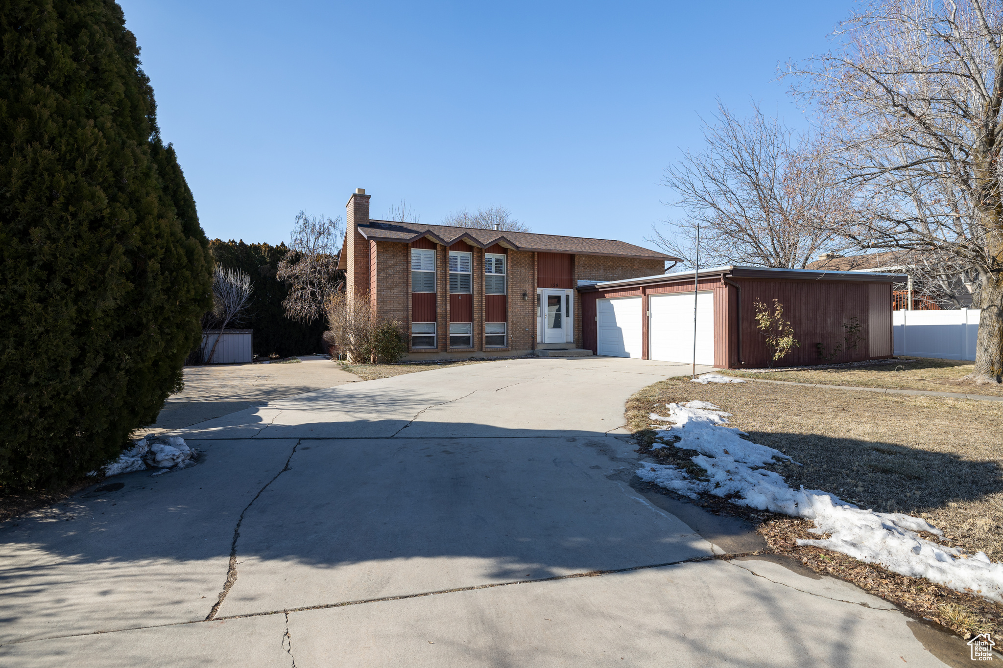 View of front of home featuring a garage