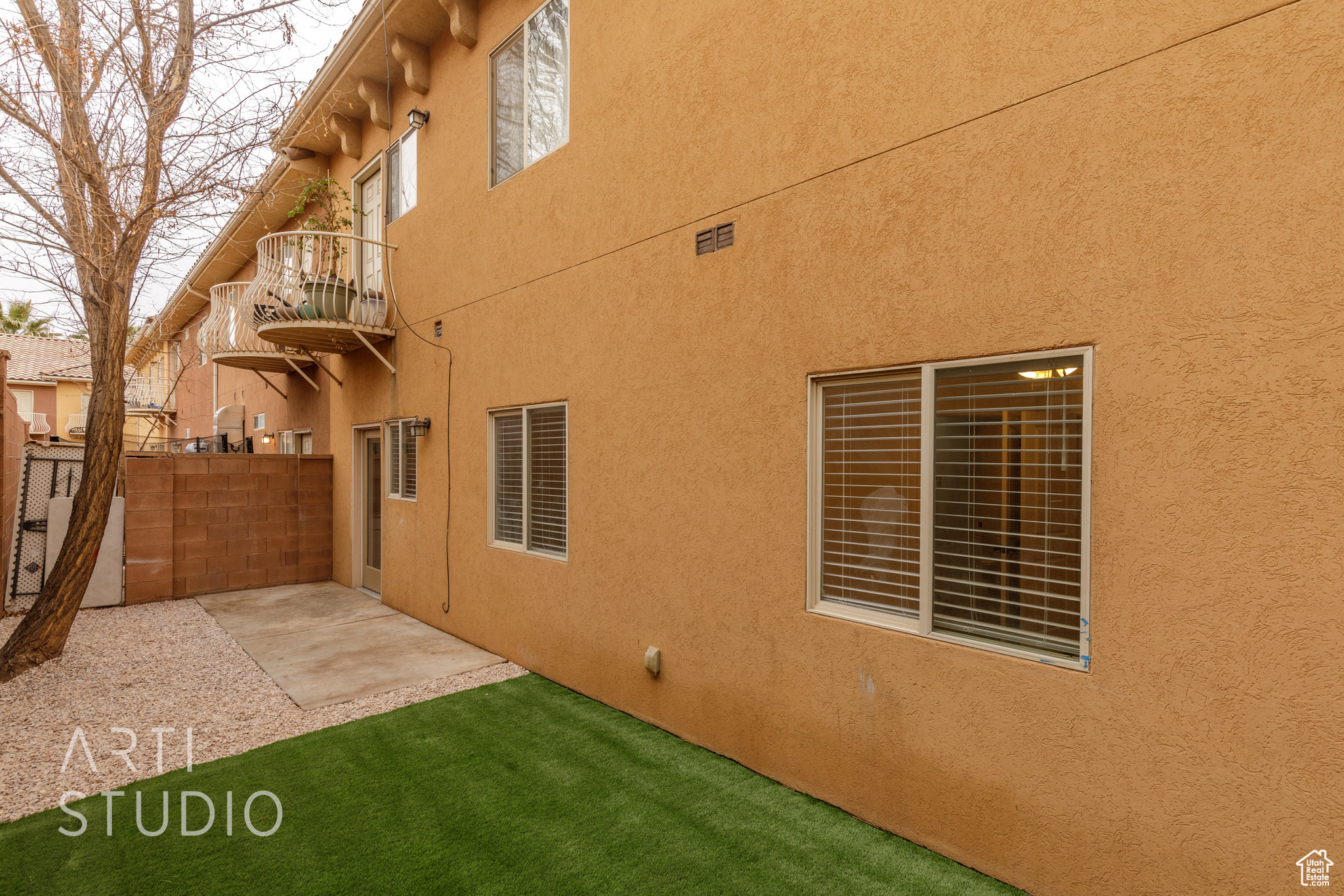 View of side of property featuring a patio area
