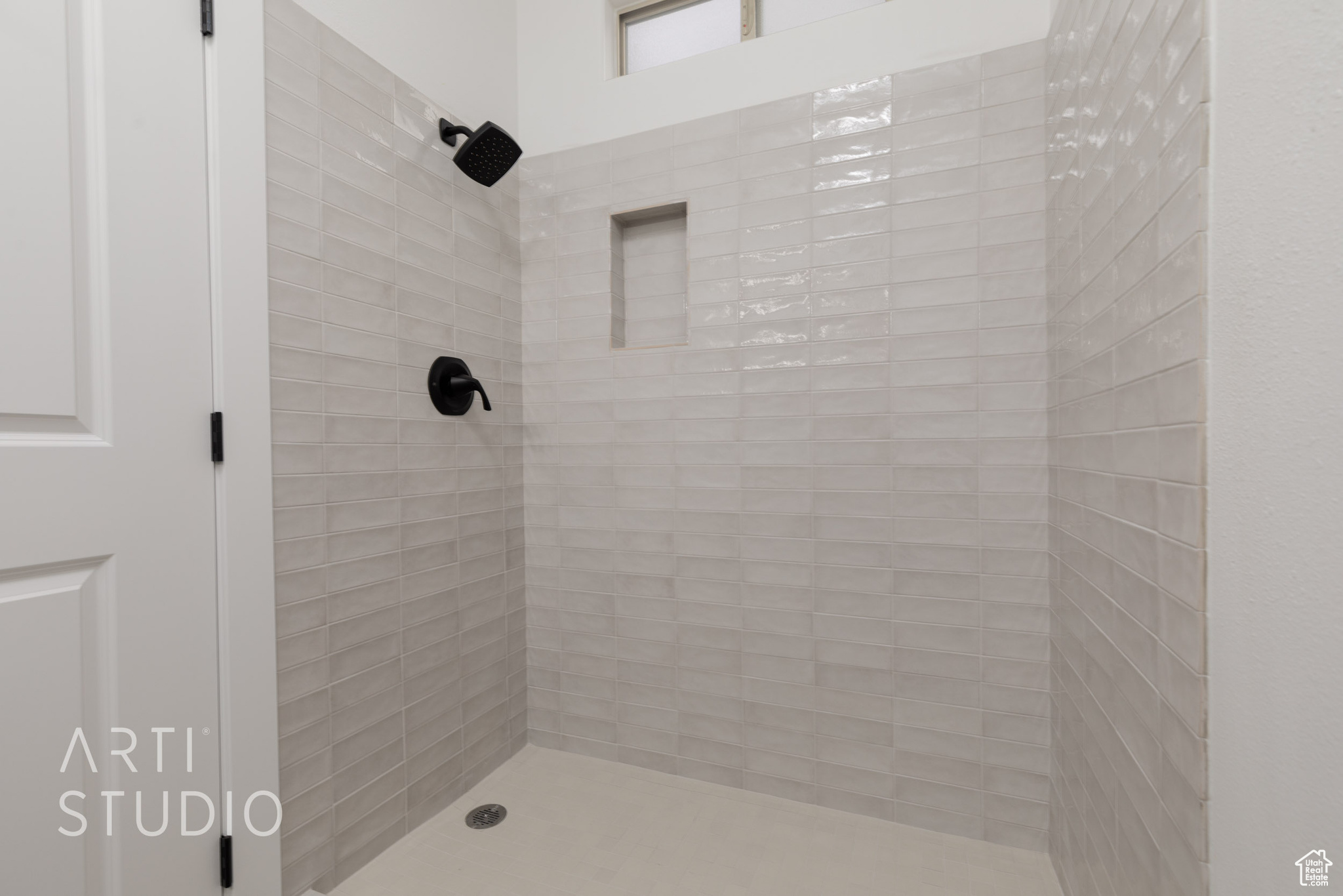 Bathroom with a tile shower