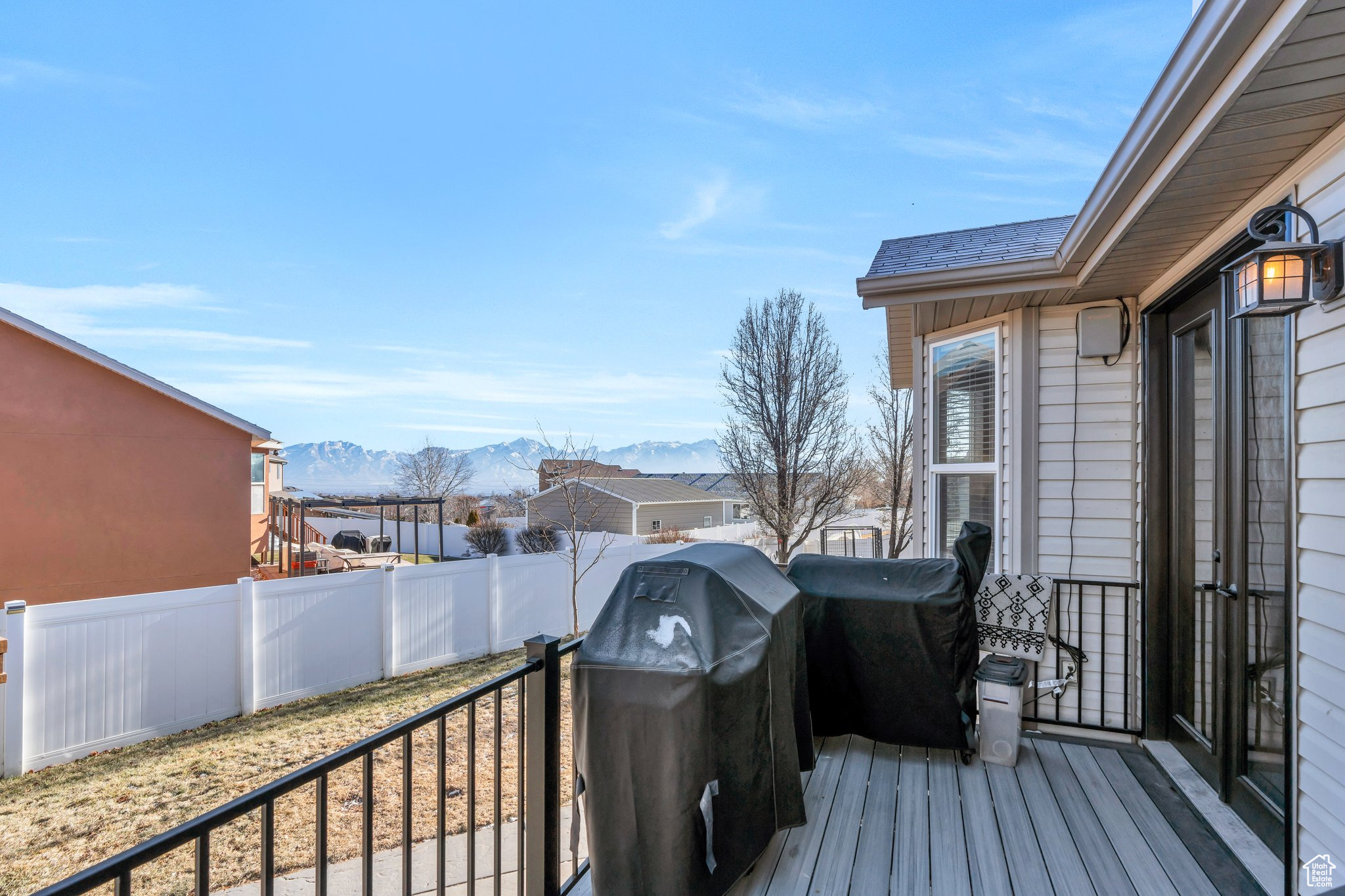 Deck featuring area for grilling and a mountain view