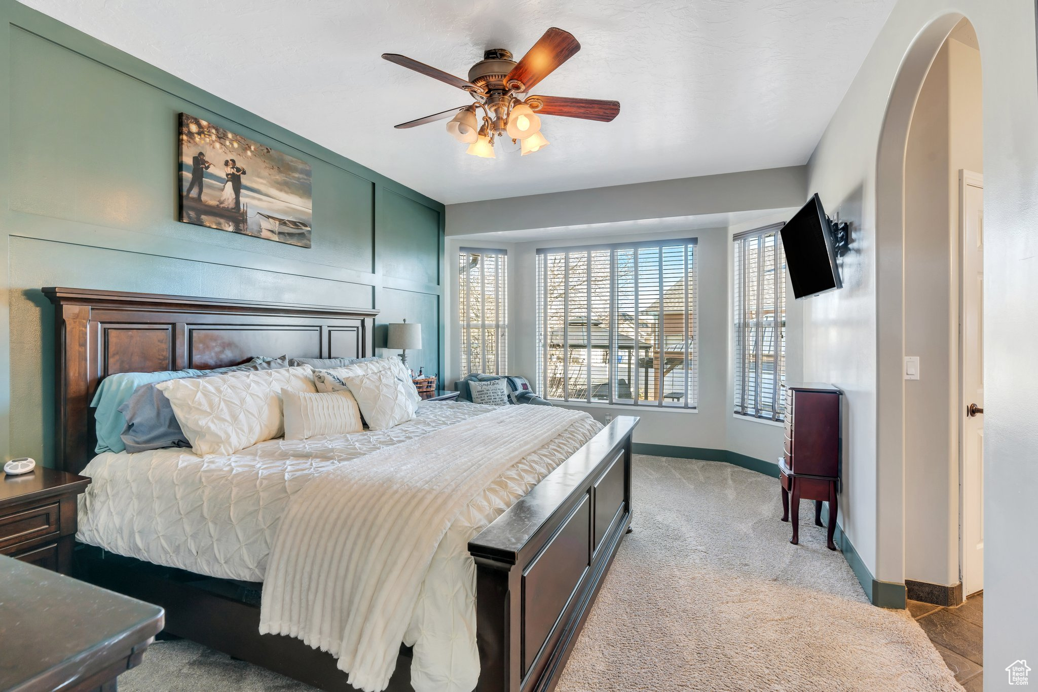 Bedroom with carpet floors and ceiling fan