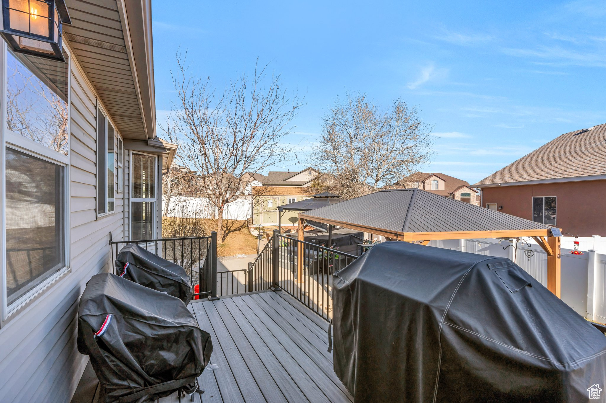 Deck featuring a grill