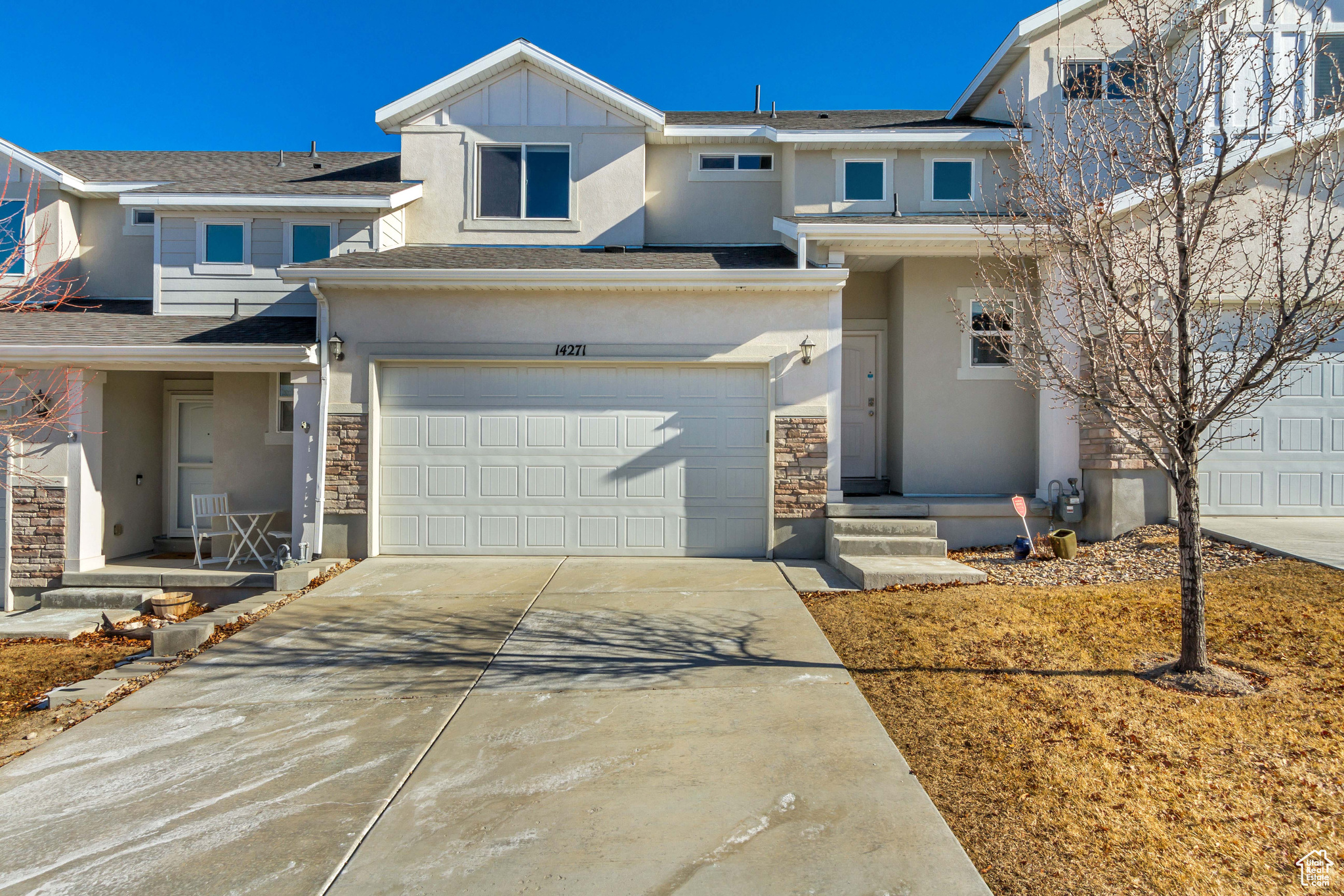 View of front of property featuring a garage