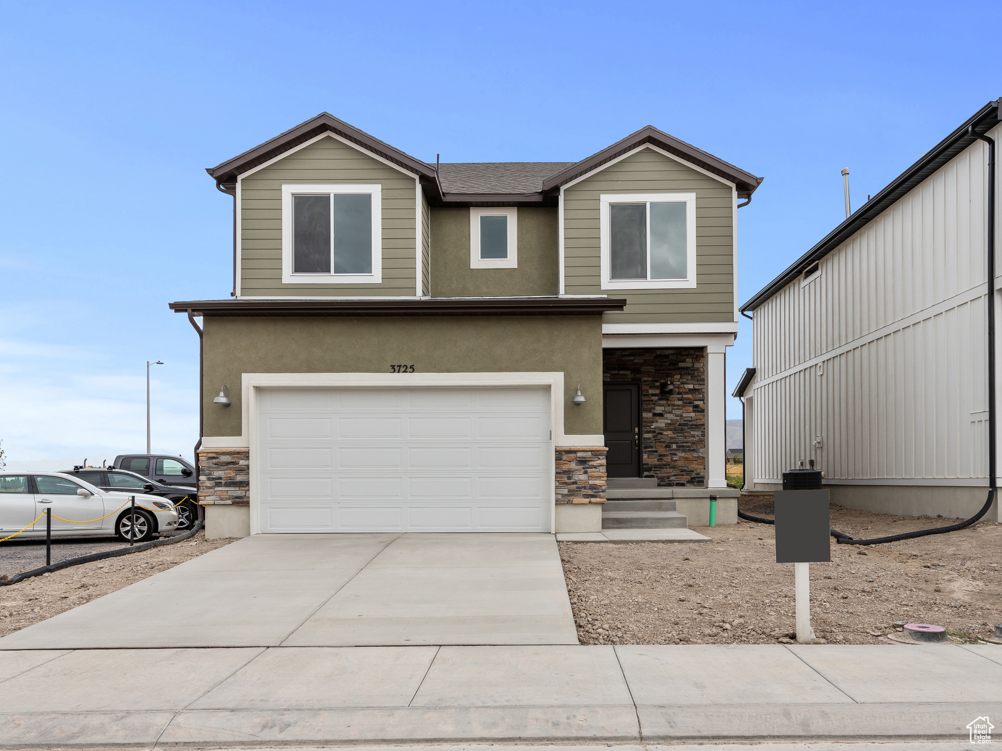 View of front of home with a garage