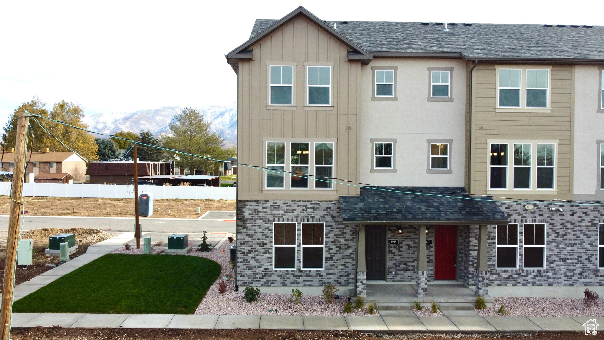 Back of house with a mountain view