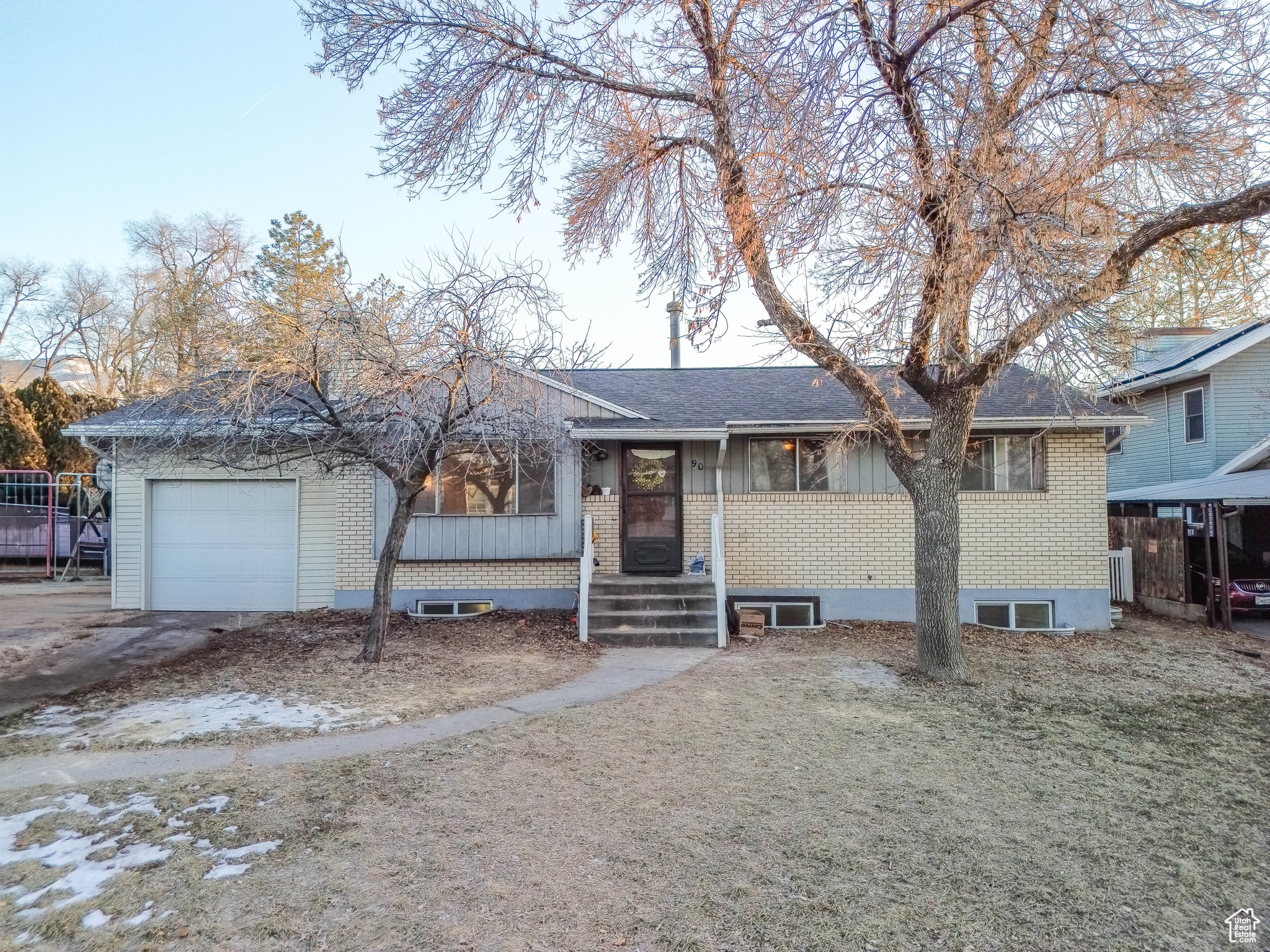 View of front of home featuring a garage