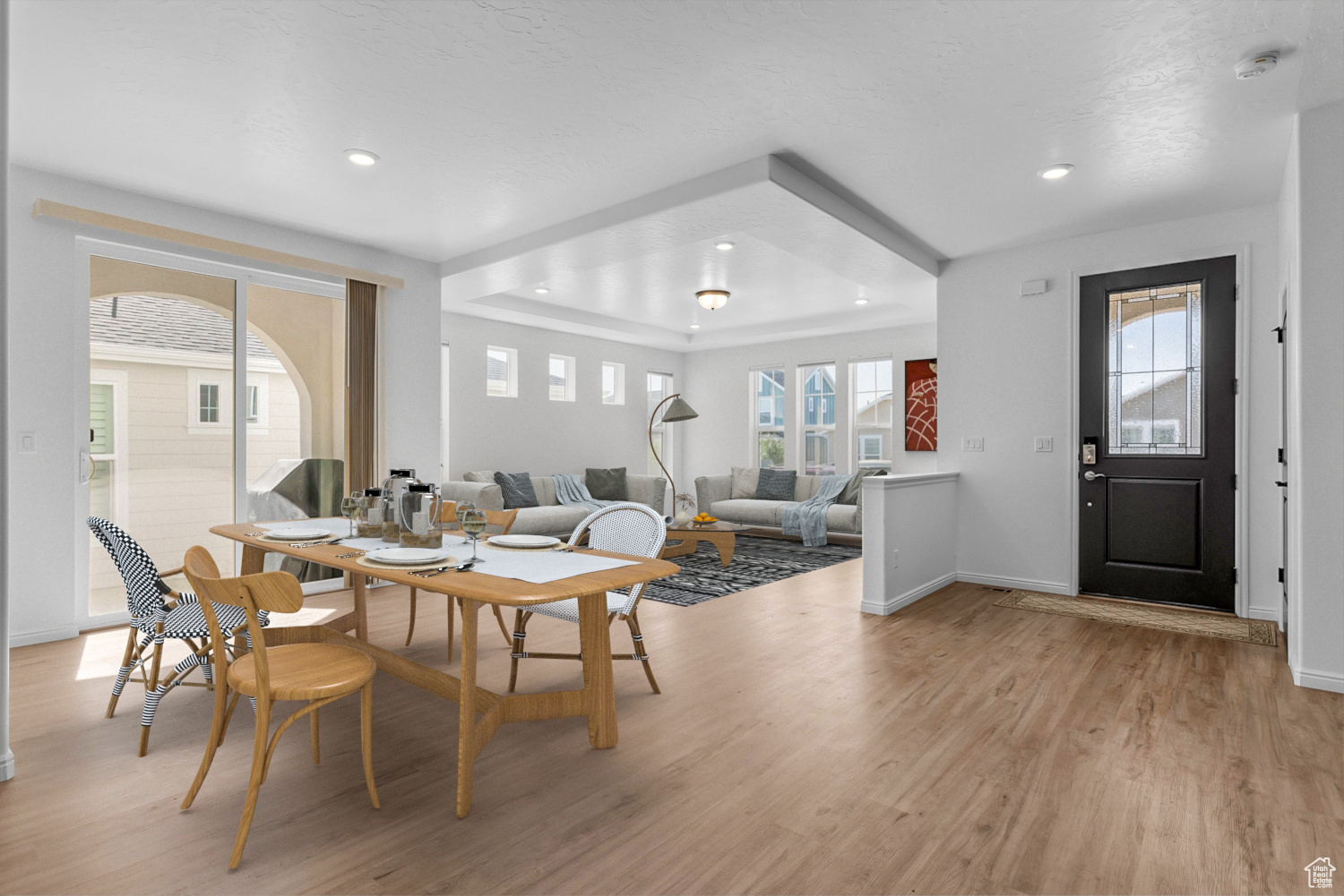 Dining area with light wood-type flooring