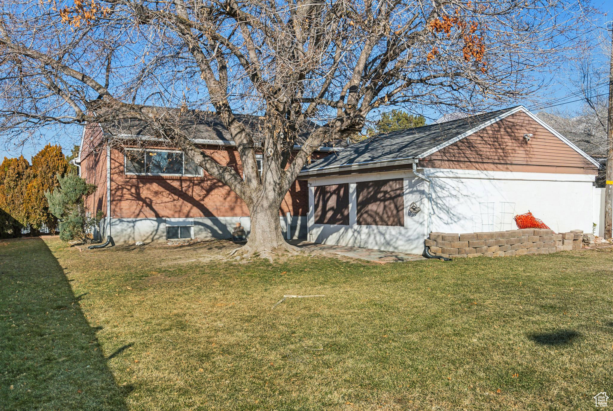 Exterior space with a lawn