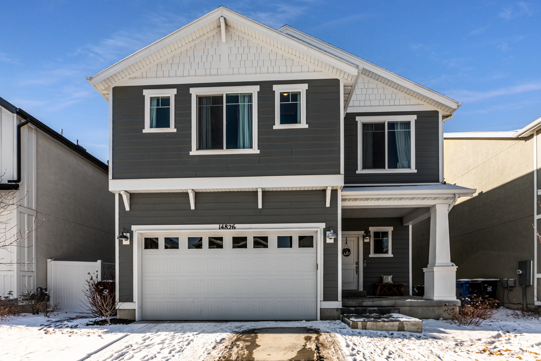 View of front of property with 2 car garage