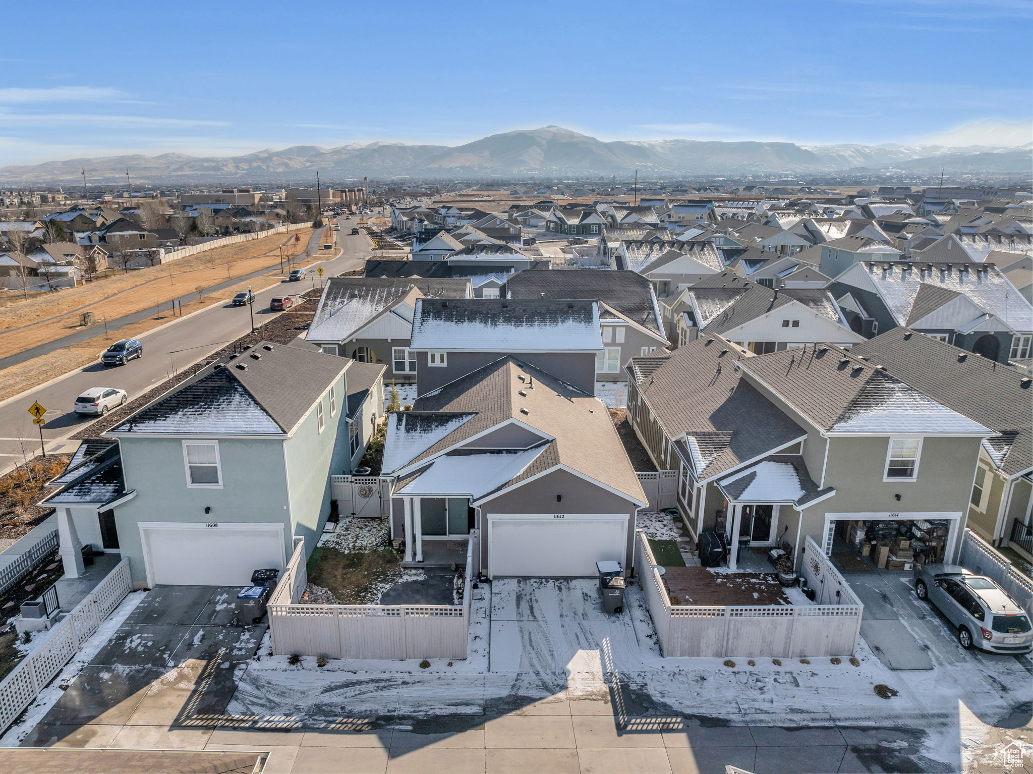 Birds eye view of property with a mountain view
