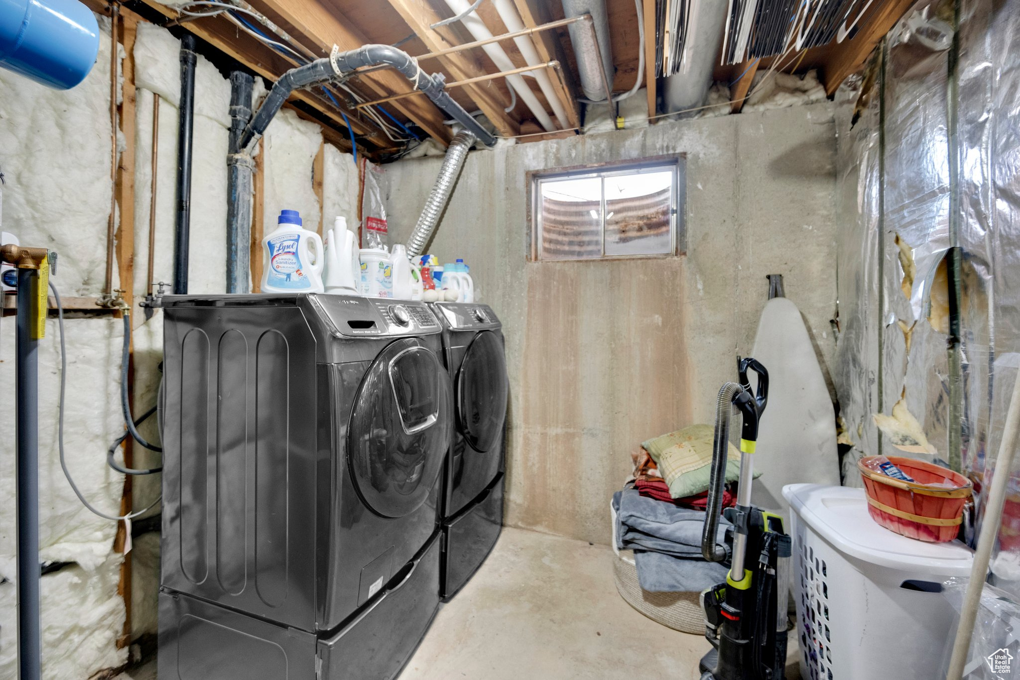 Laundry room with separate washer and dryer