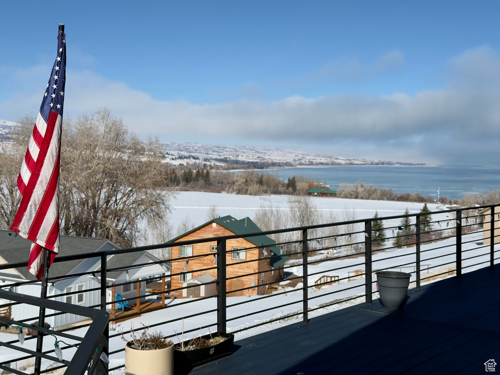 View of deck featuring a water view