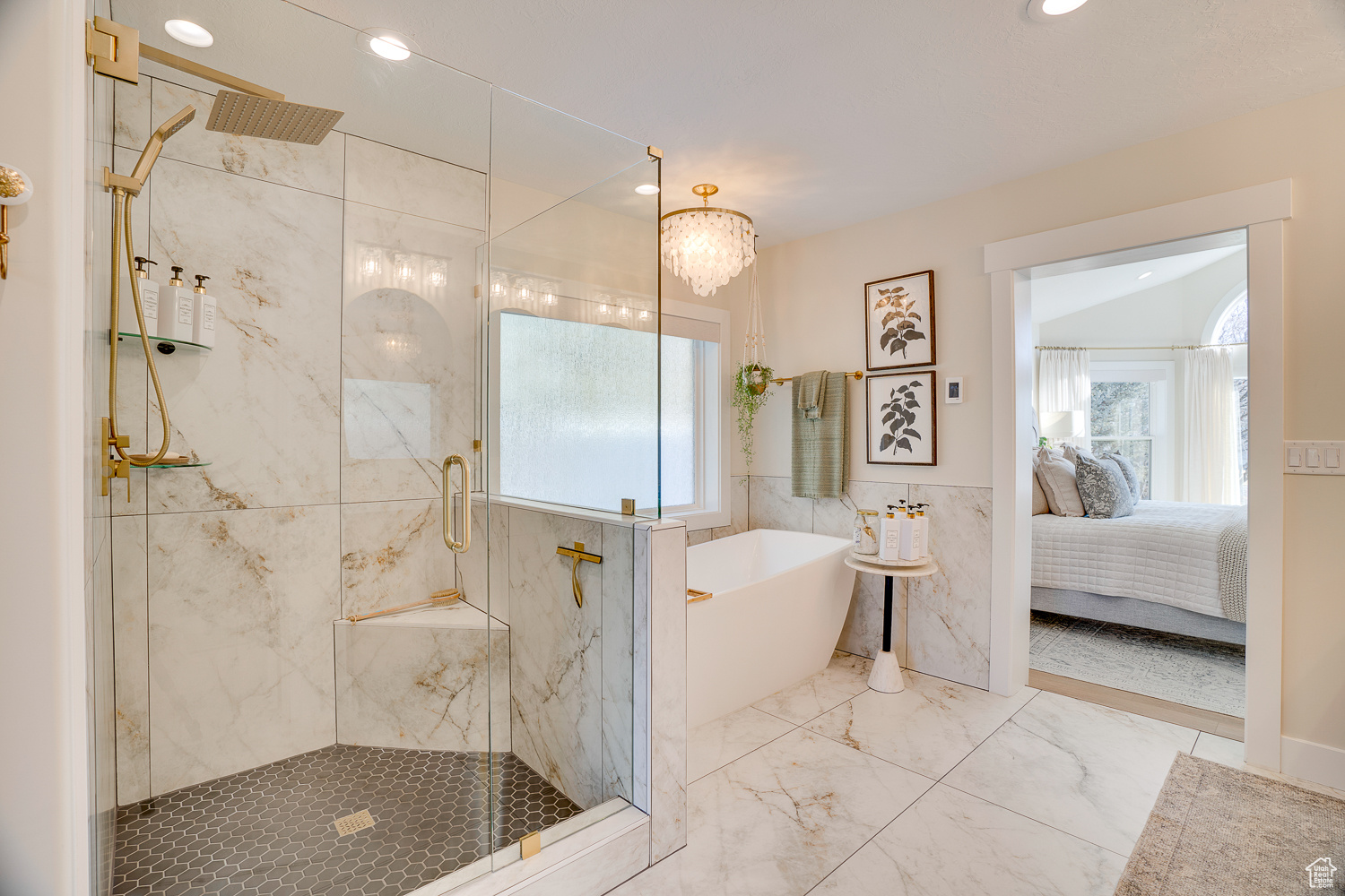 Bathroom with separate shower and tub, plenty of natural light, and tile walls