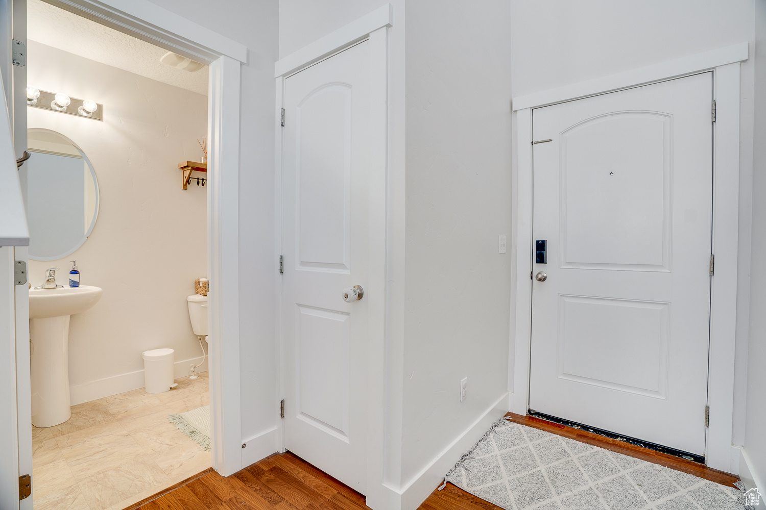 Entryway featuring hardwood / wood-style flooring