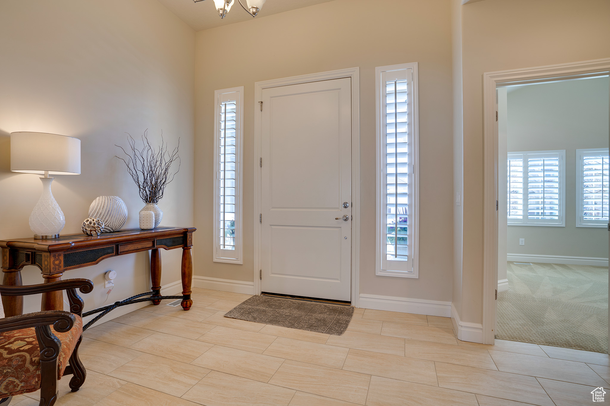 View of carpeted entrance foyer