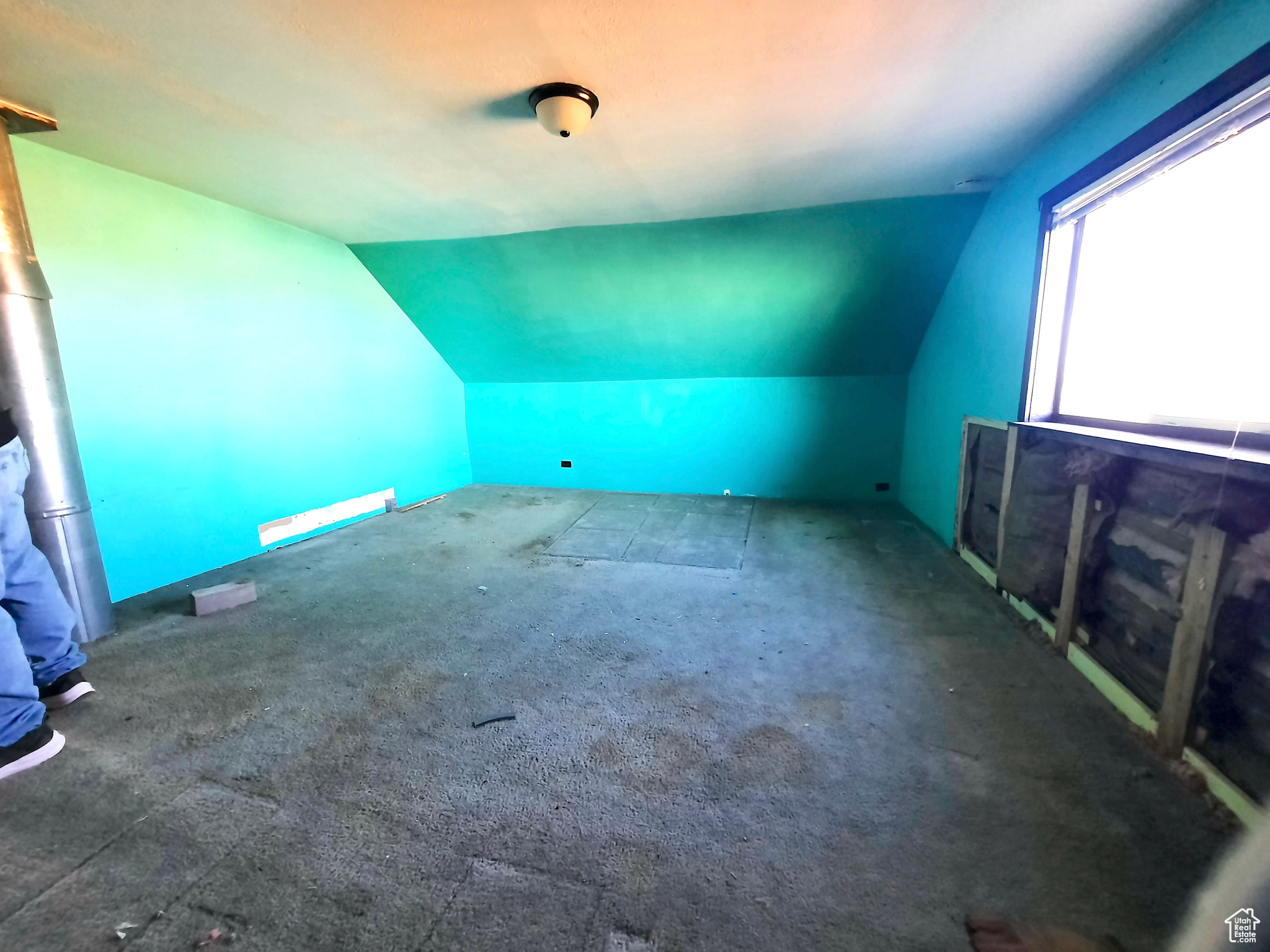 Bonus room featuring lofted ceiling