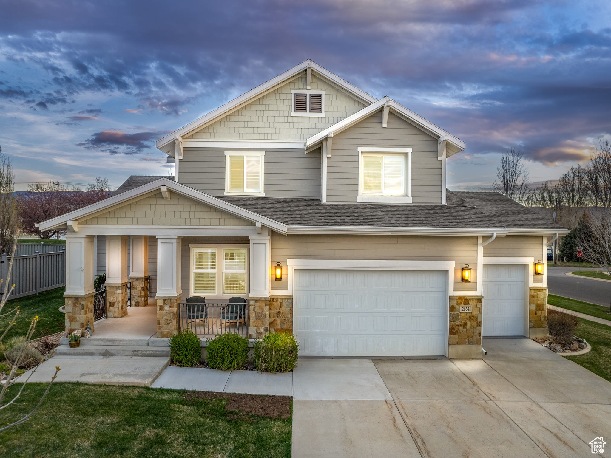 Craftsman house featuring a garage and covered porch