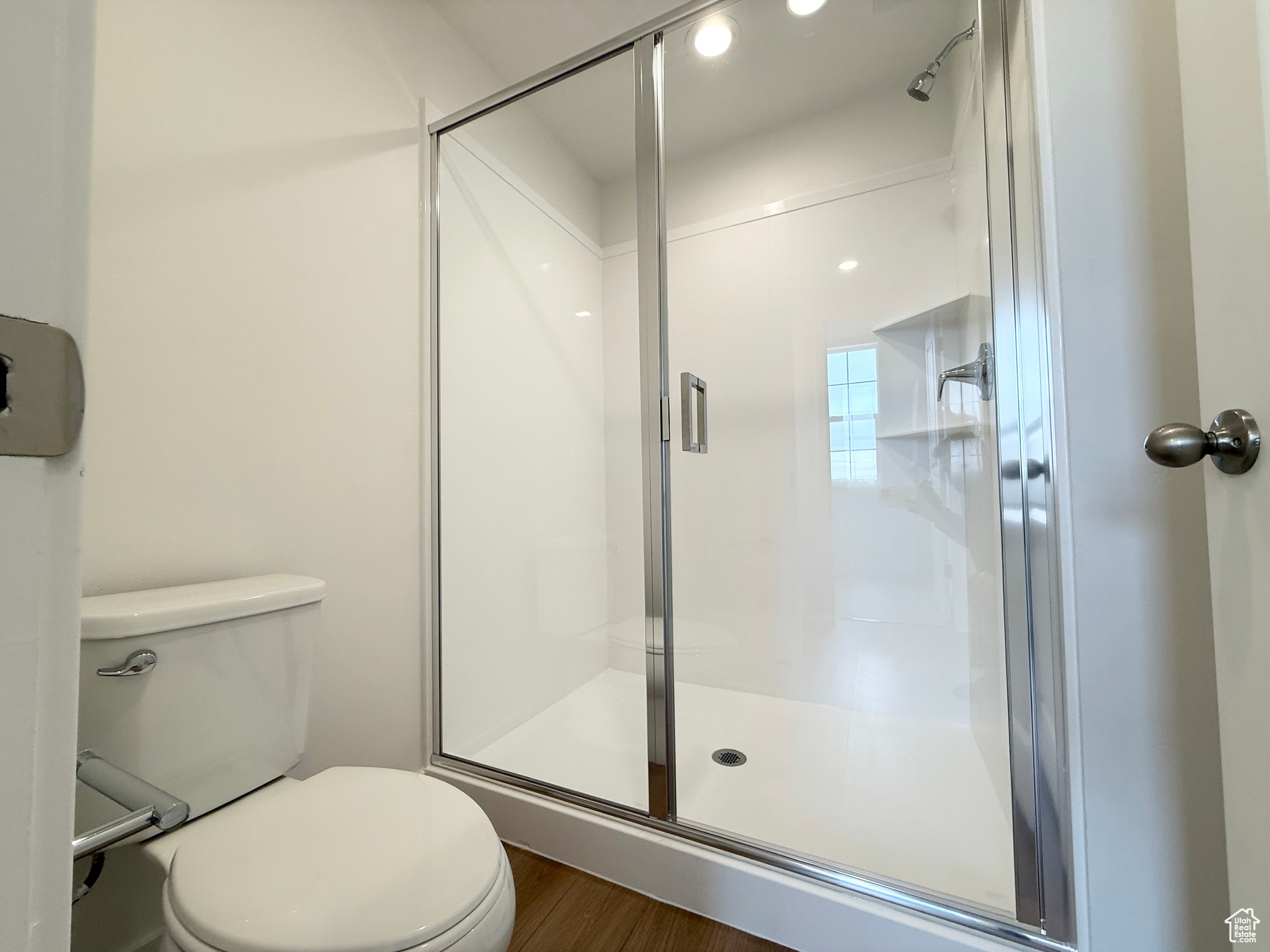 Master bath, toilet and 5 foot walk in shower separated from vanity