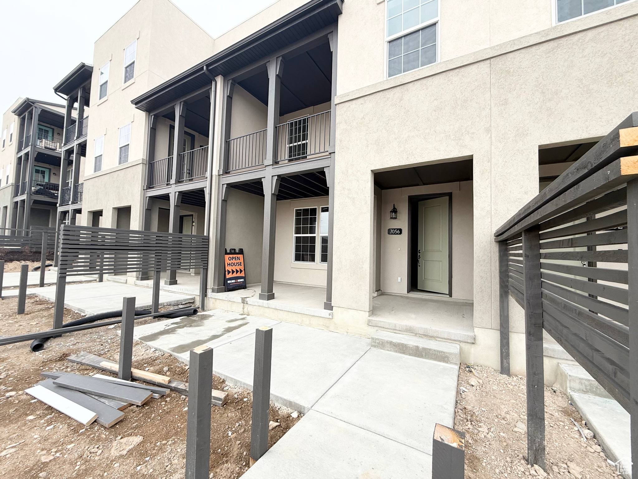 Front patio, fence in progress