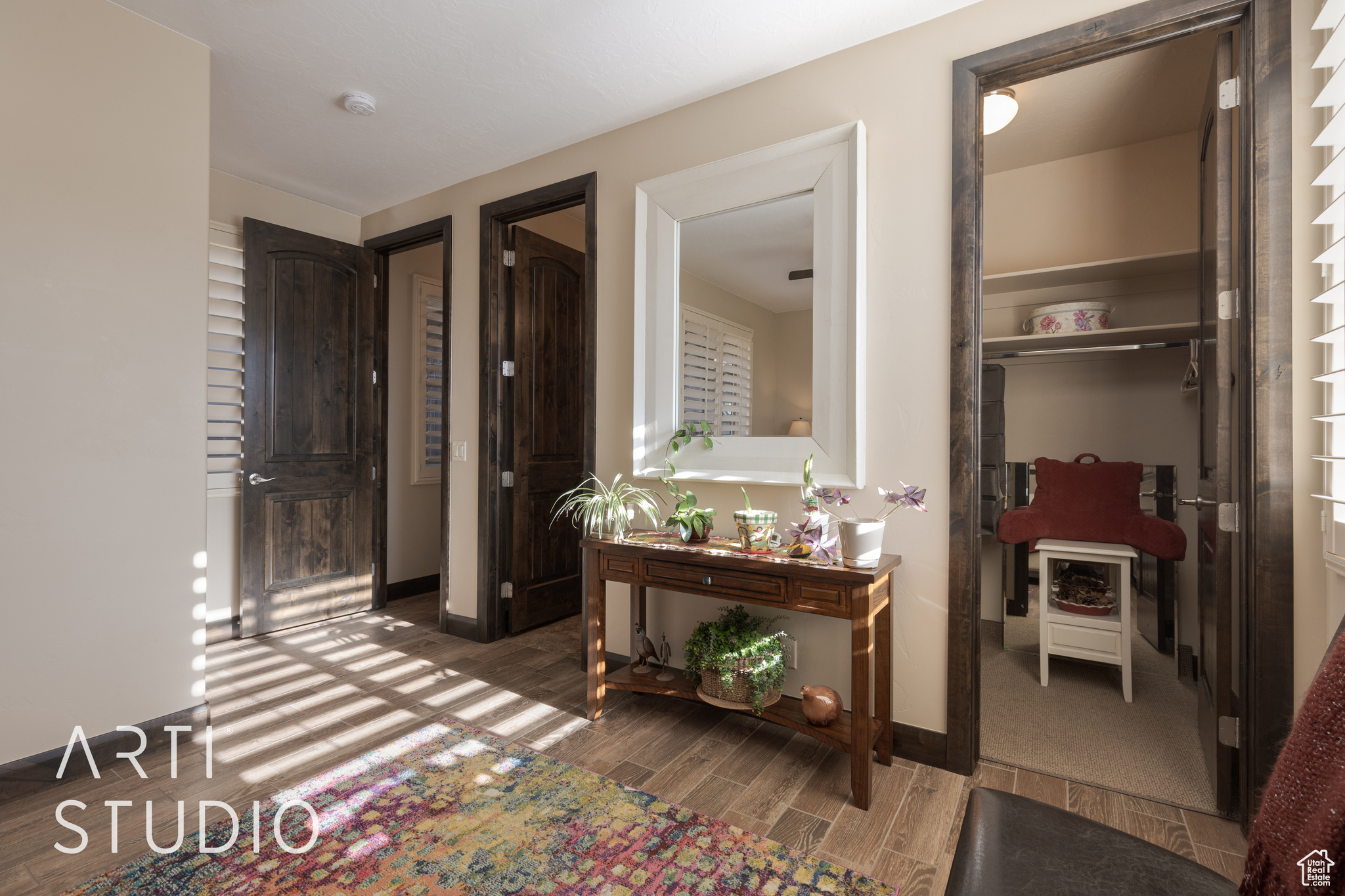 bedroom 2 featuring wood look tile flooring