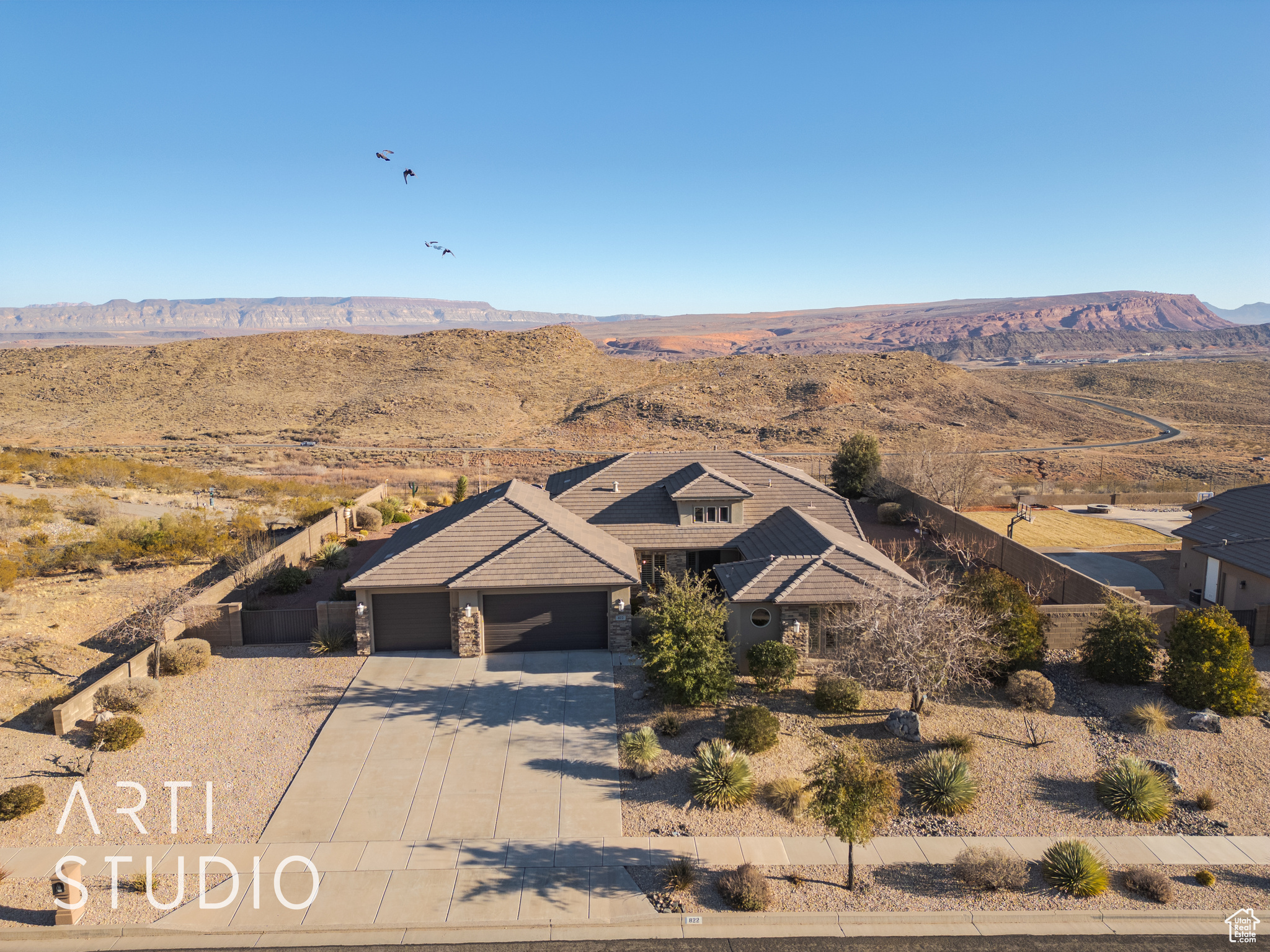 Birds eye view of property featuring a mountain  and golf course view