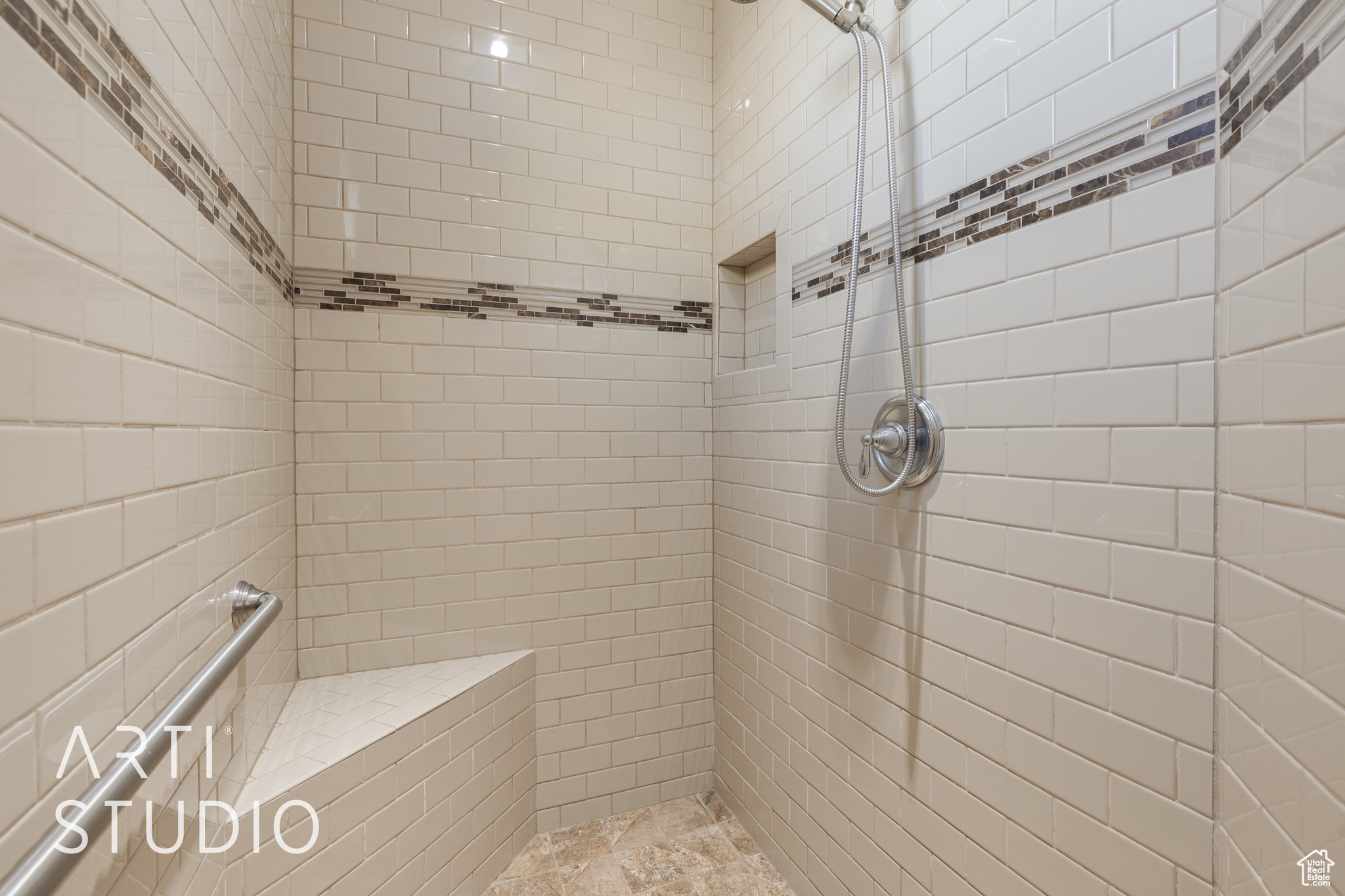 Master bathroom with custom tiled shower