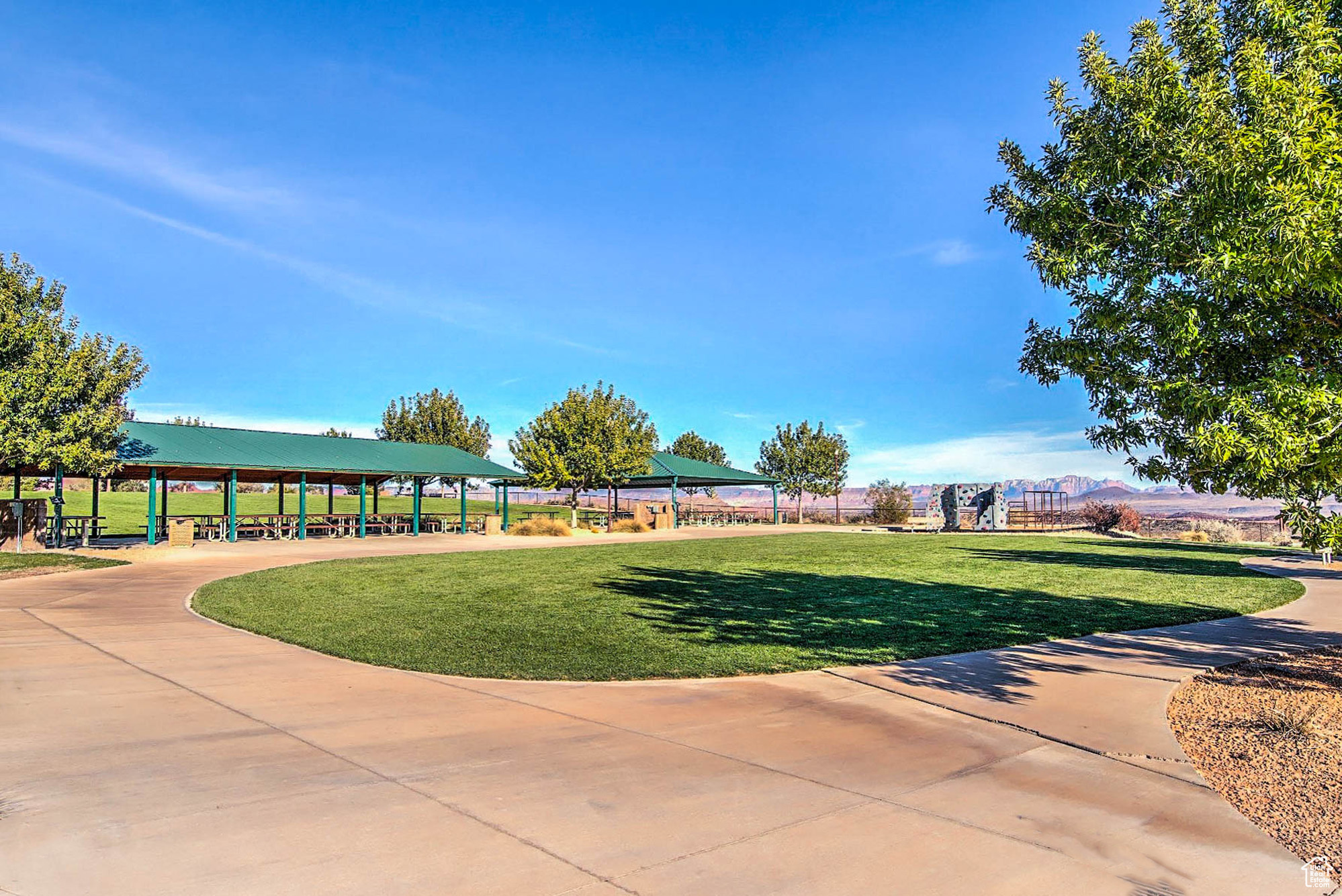 Surrounding community with a gazebo and a lawn