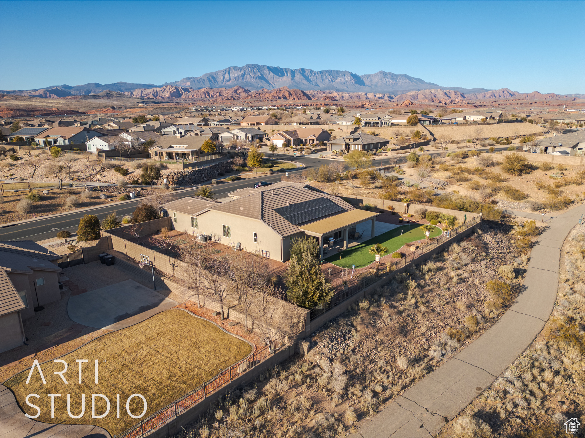 Birds eye view of property with a mountain view and golf course ciew