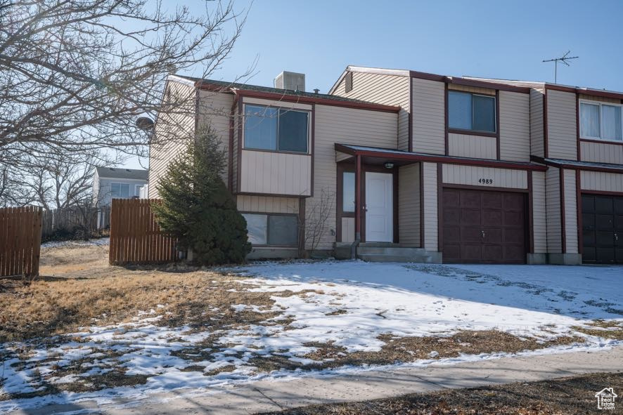 View of front of home featuring a garage