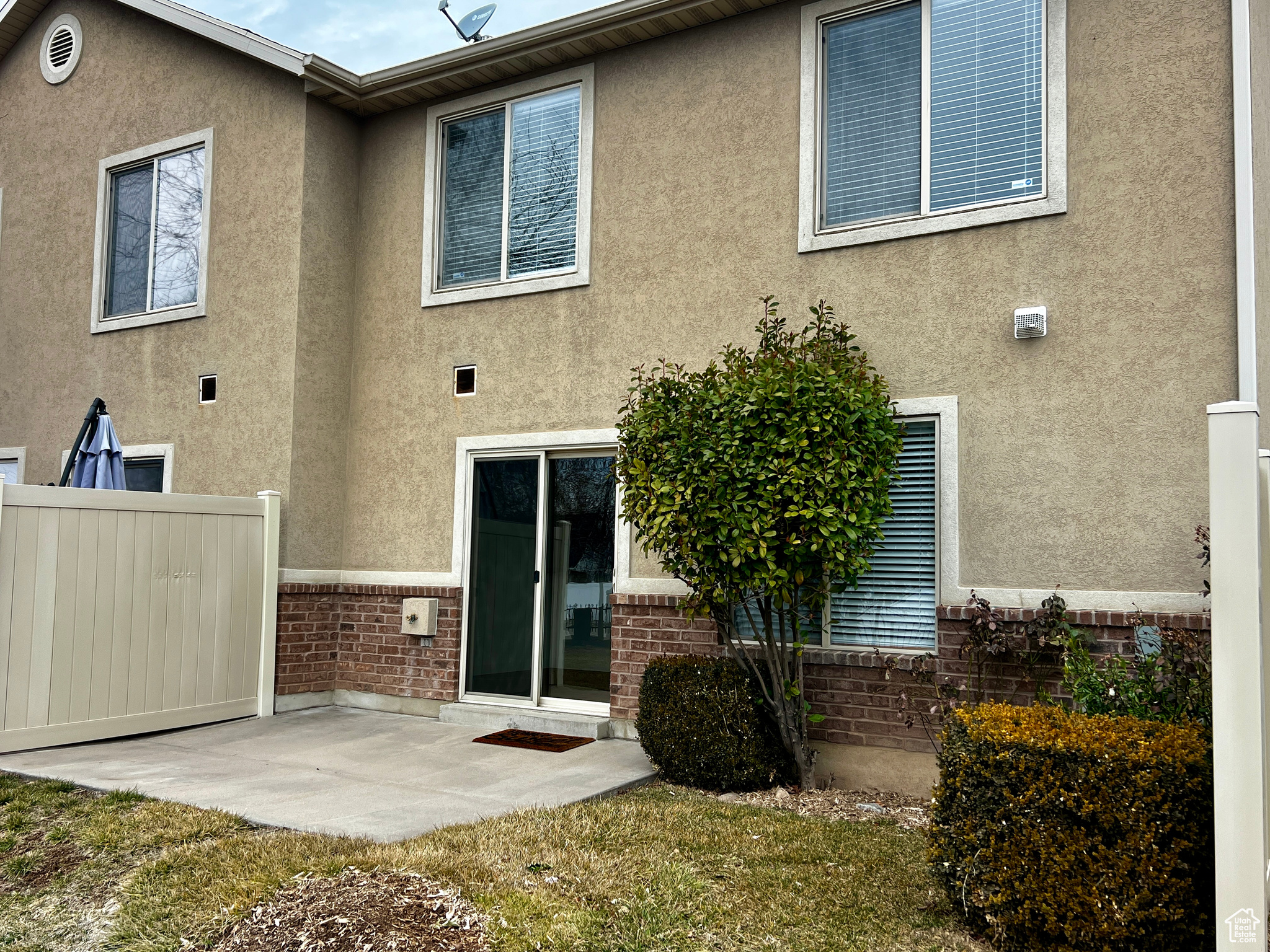 Rear view of house with a patio