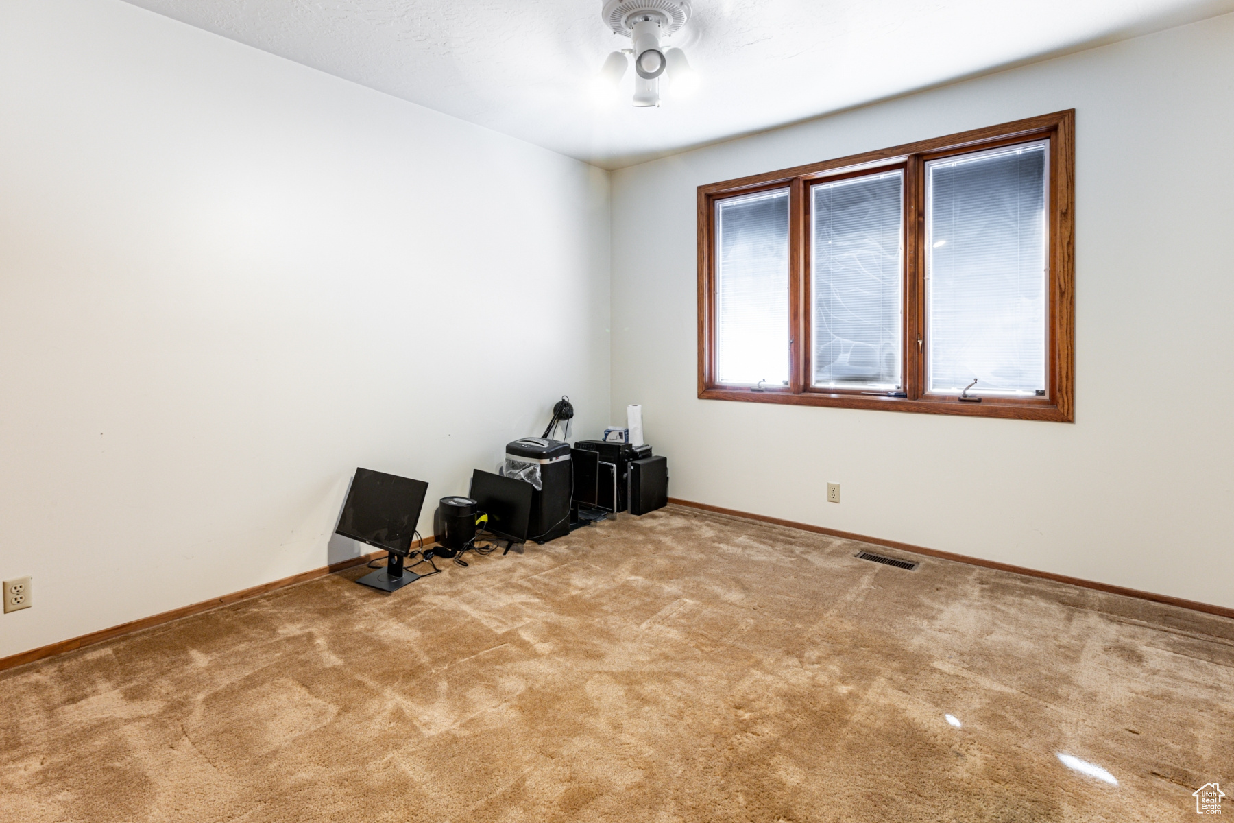 View of carpeted spare room