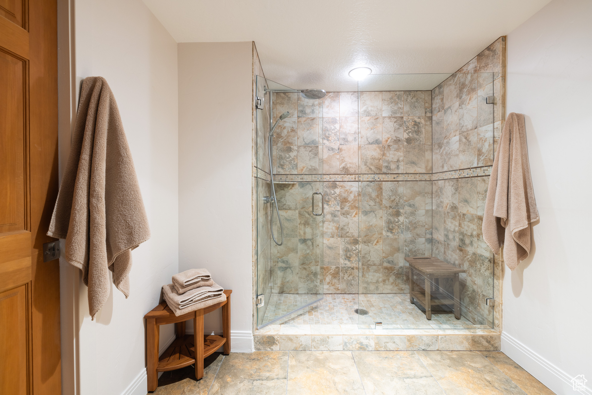 Bathroom featuring walk in shower