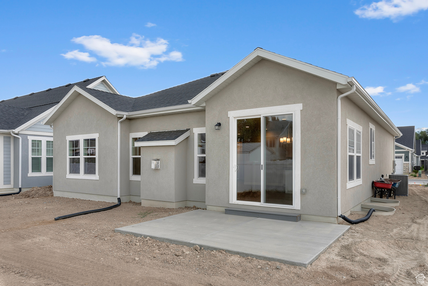 Rear view of house featuring a patio