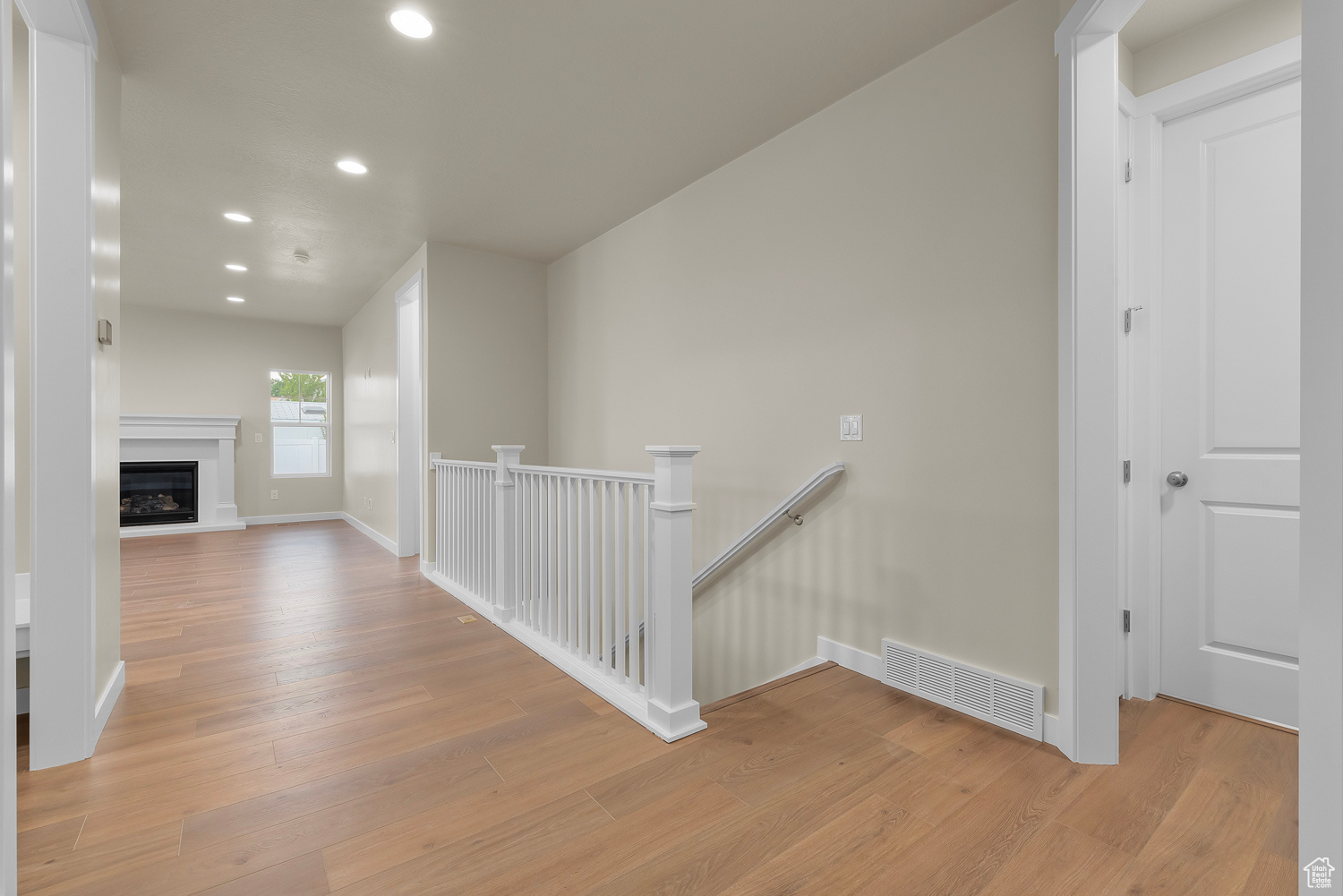 Hallway featuring light hardwood / wood-style floors