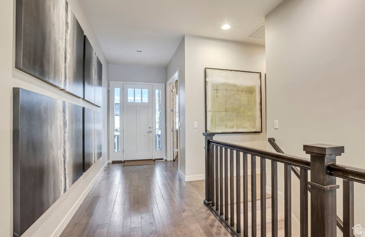 Foyer entrance featuring wood-type flooring