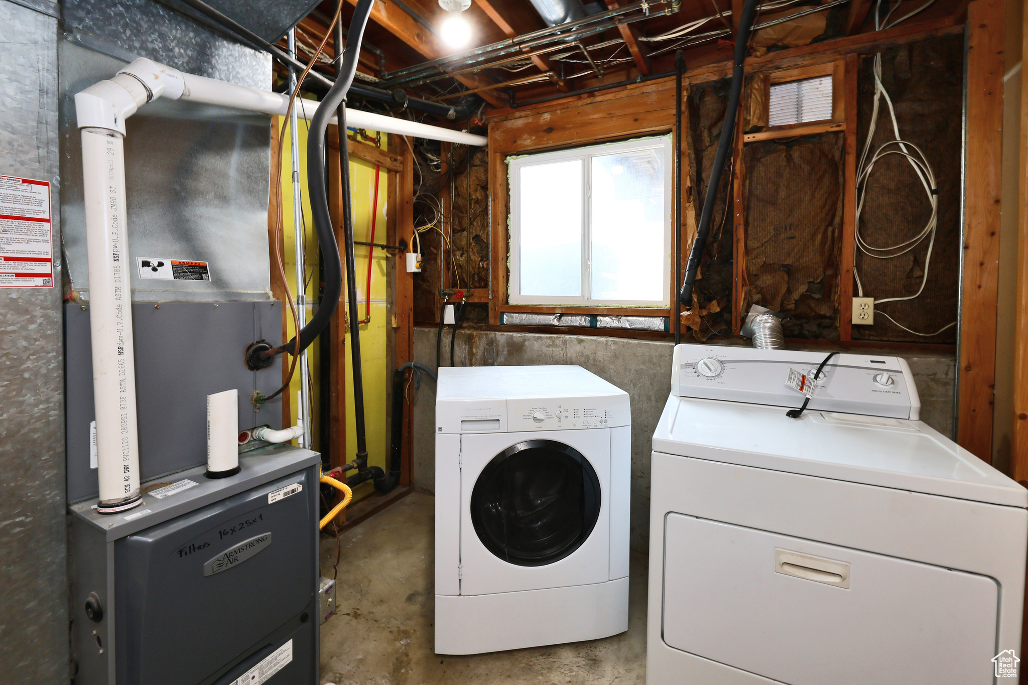 Laundry area with washing machine and dryer