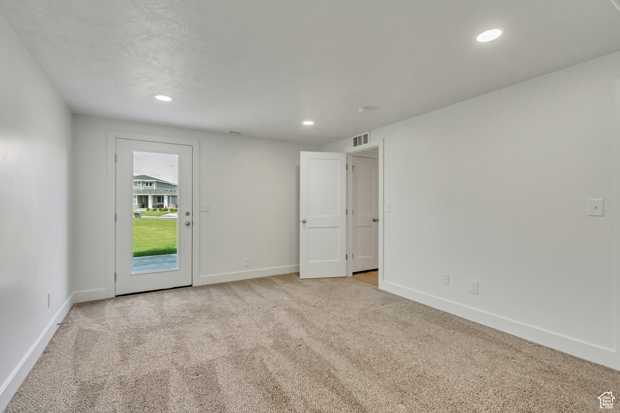 View of carpeted spare room