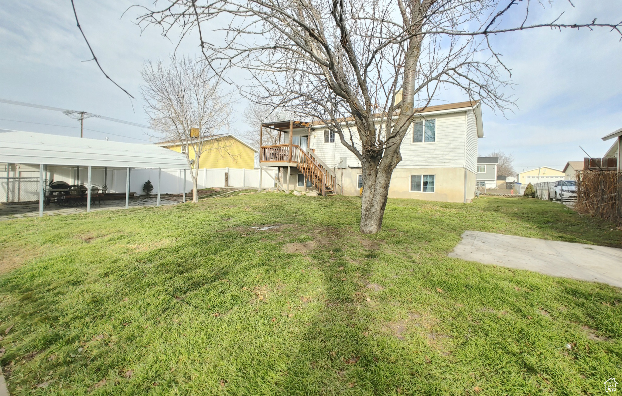 View of yard featuring a carport