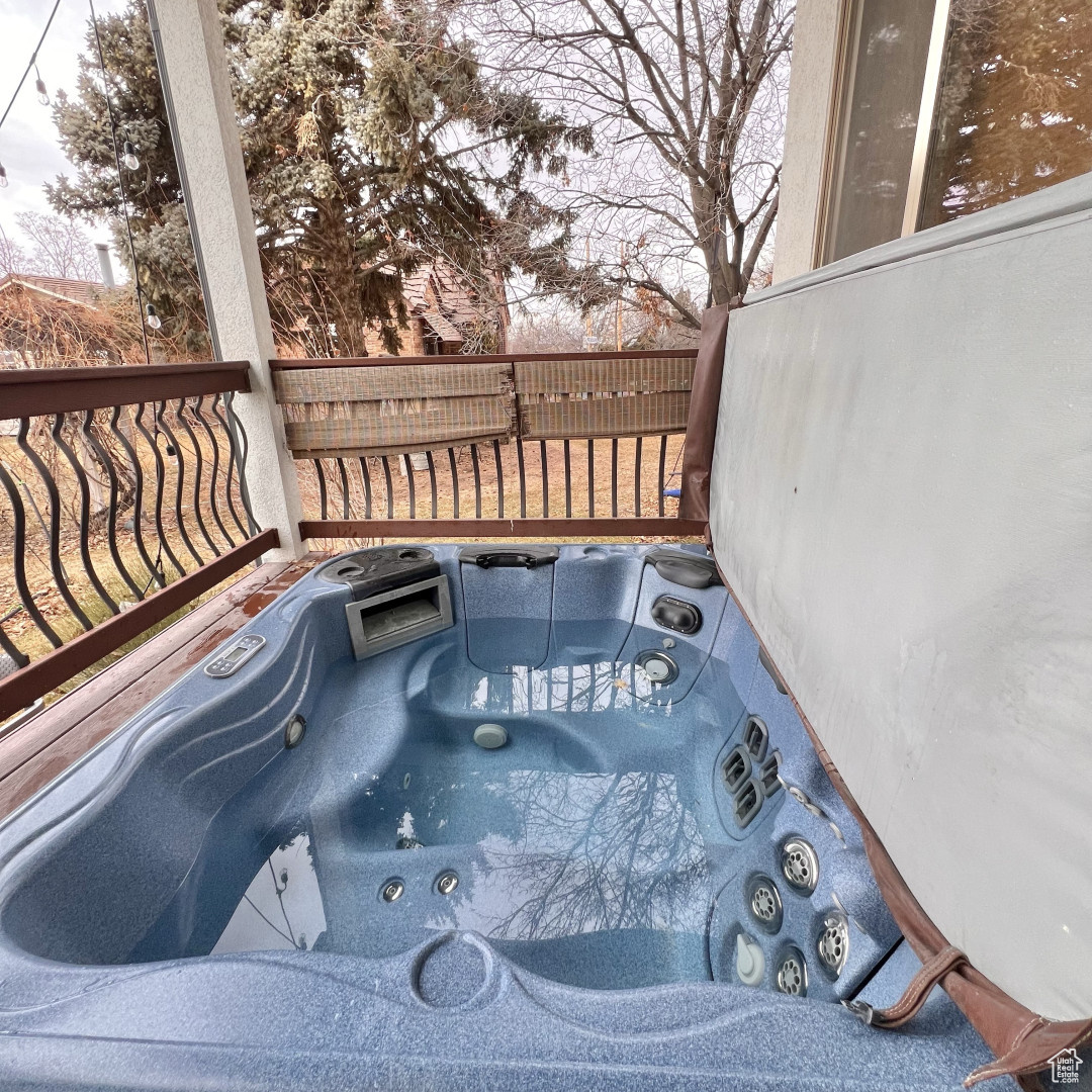 Deck featuring a hot tub