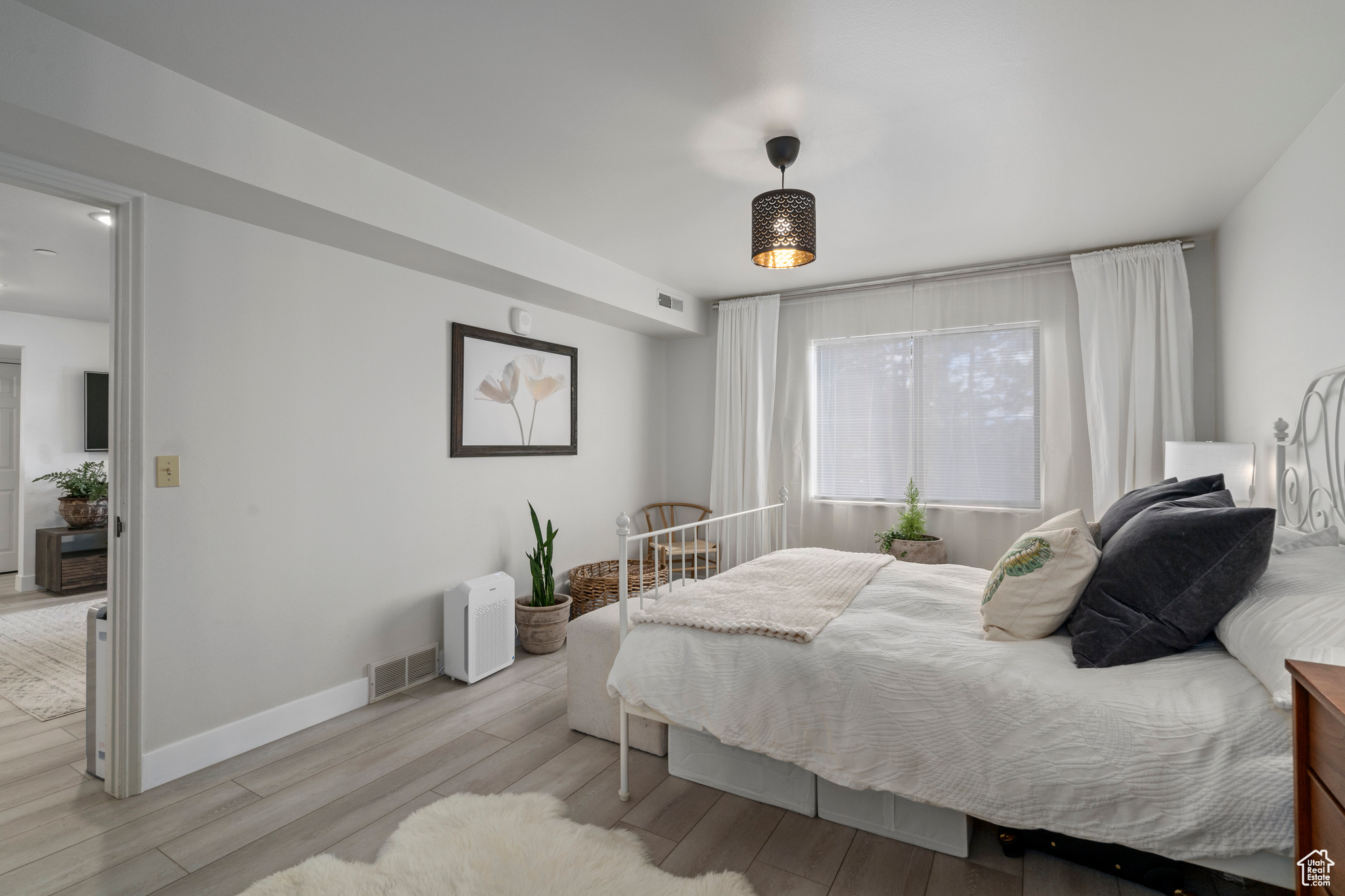 Bedroom featuring light hardwood / wood-style flooring