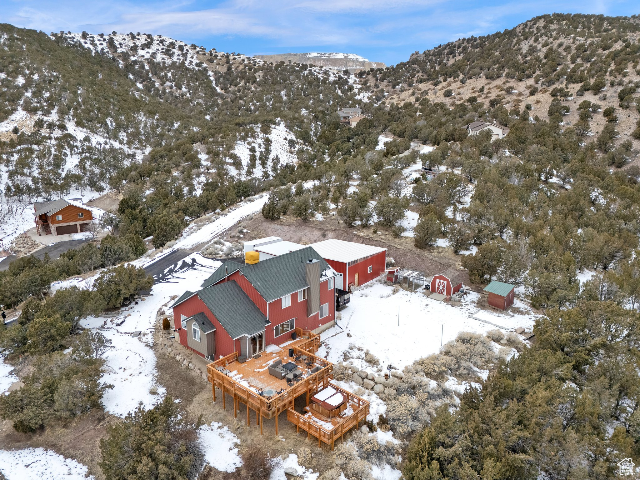 Snowy aerial view with a mountain view