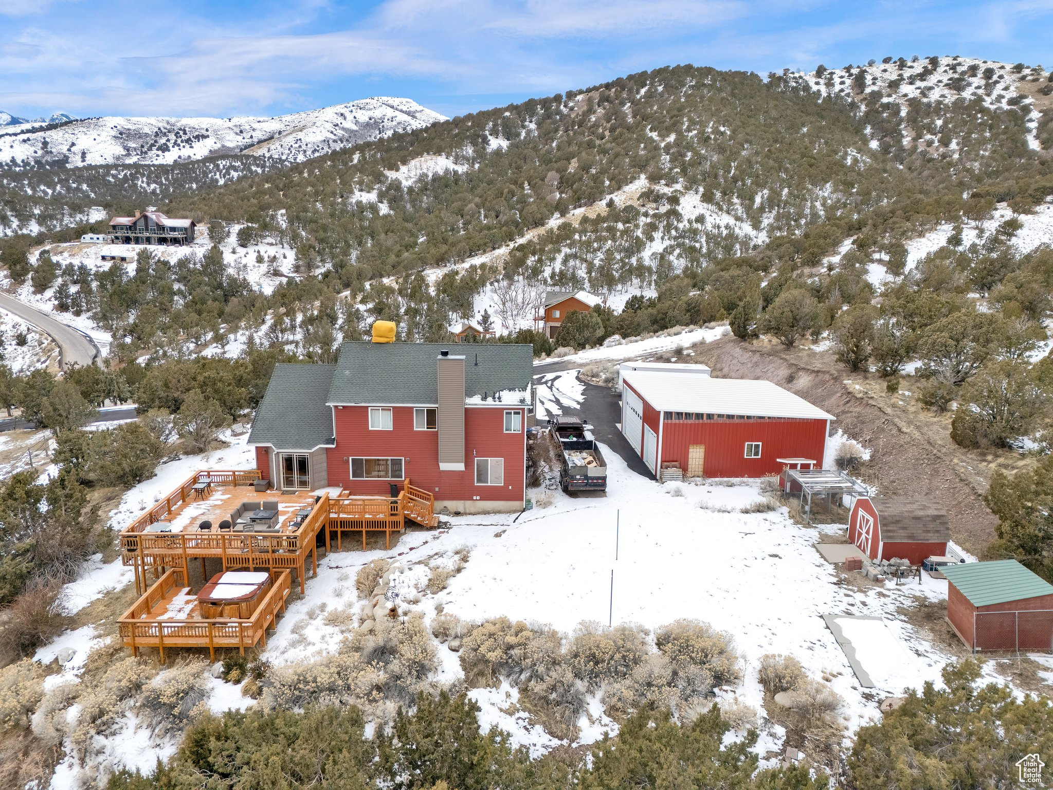 Snowy aerial view with a mountain view