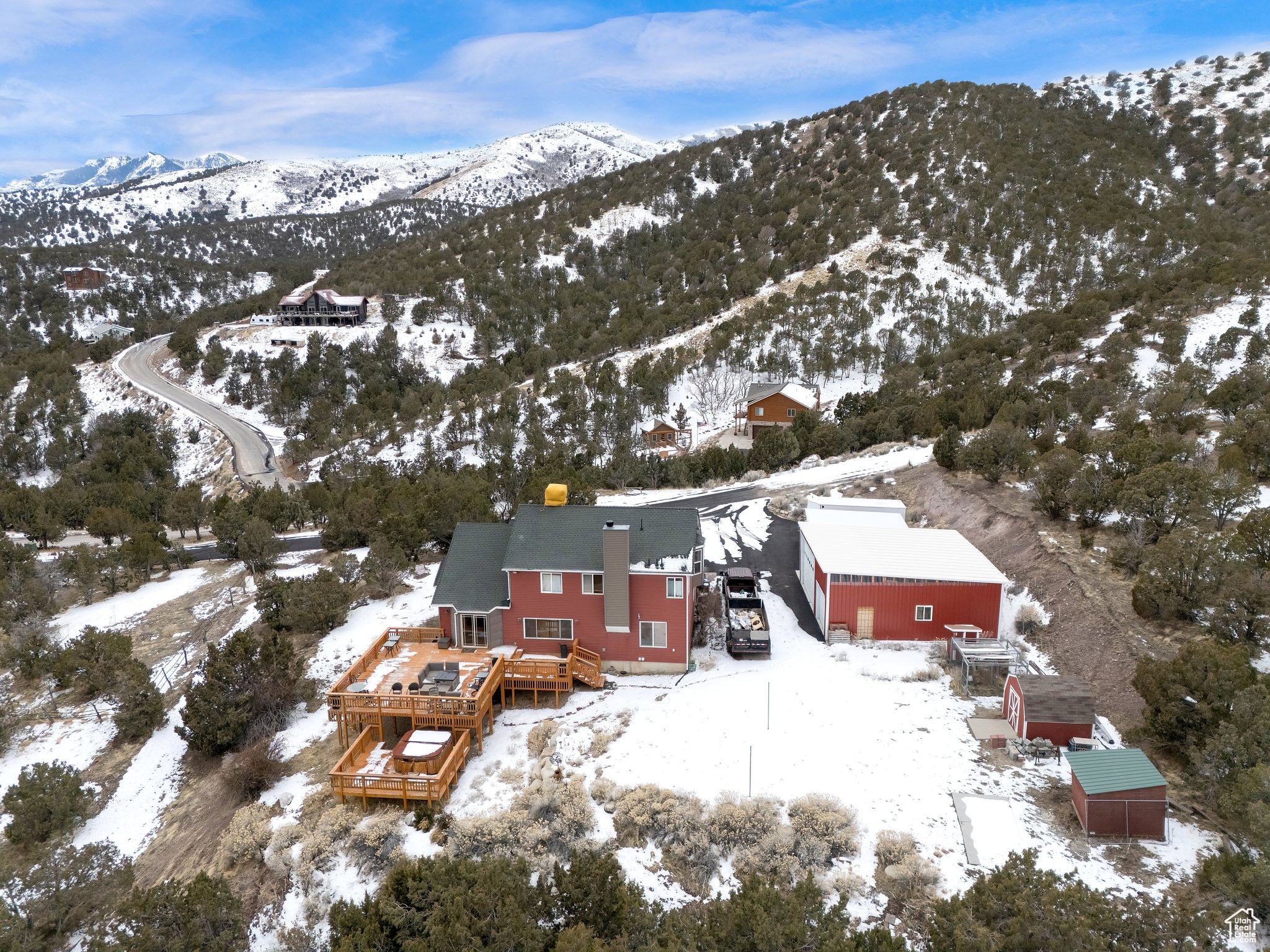 Snowy aerial view with a mountain view