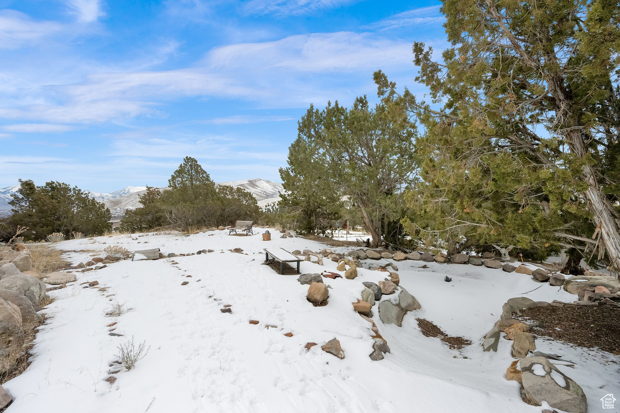 View of snow covered land featuring a mountain view