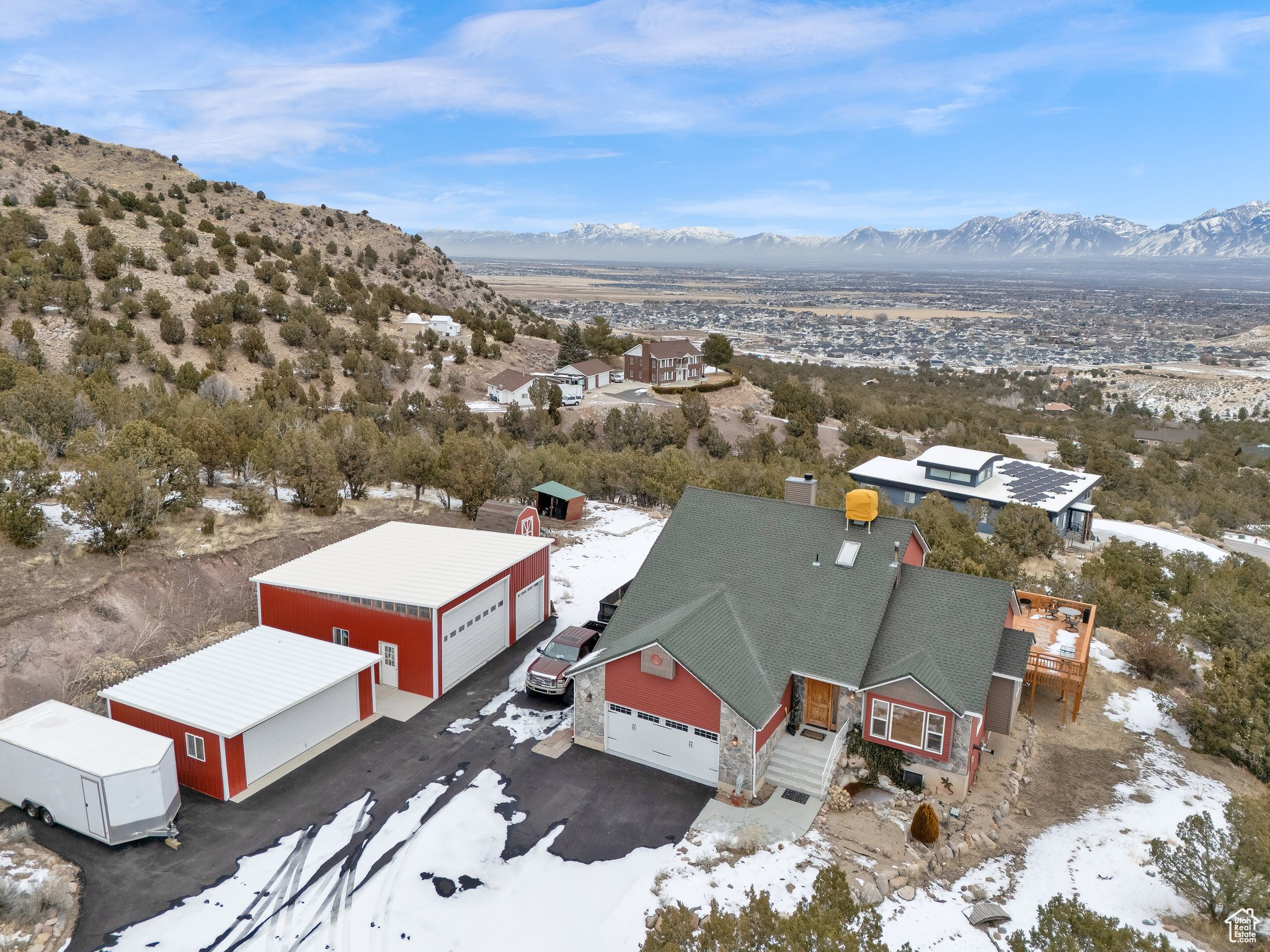 Snowy aerial view with a mountain view