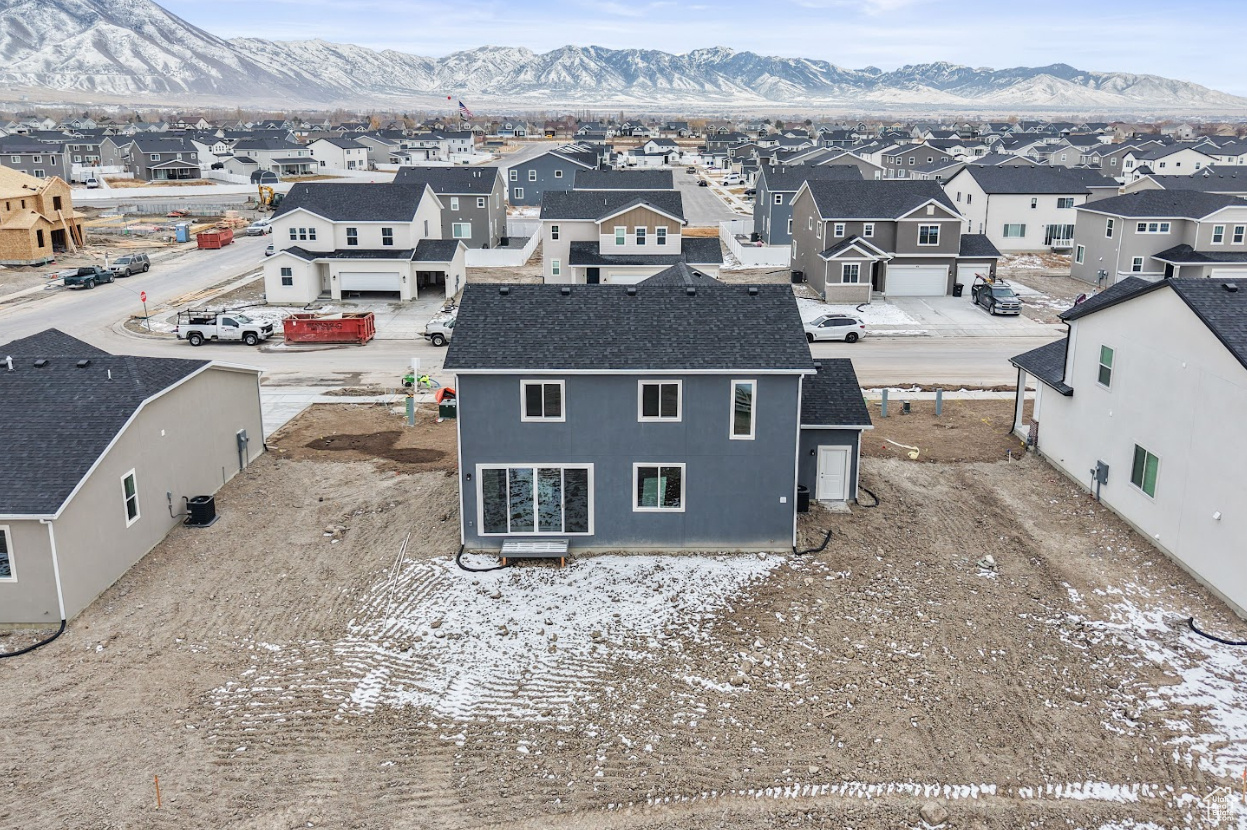 Arial view featuring back of property