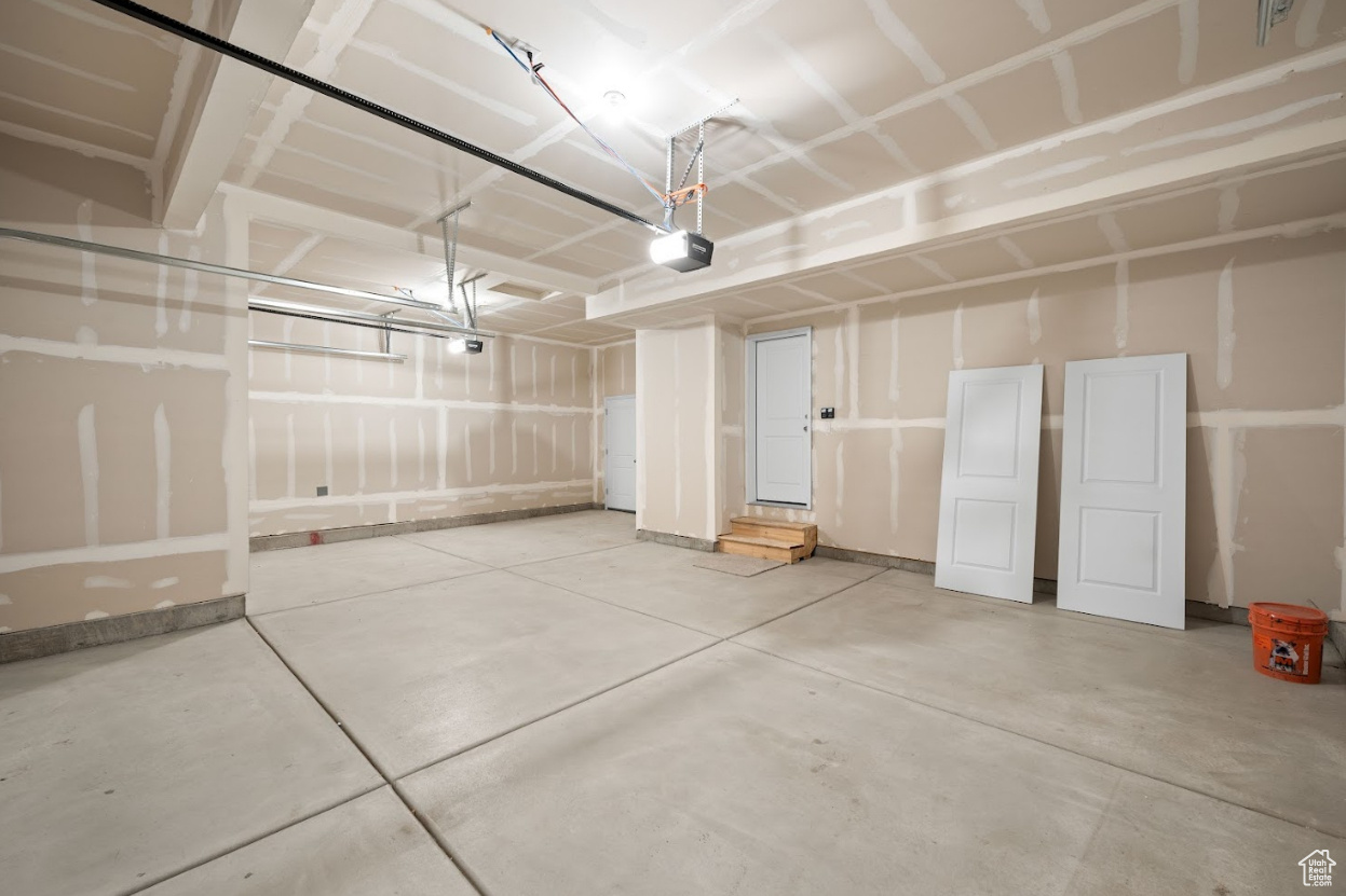 Garage with additional side door to the back of property