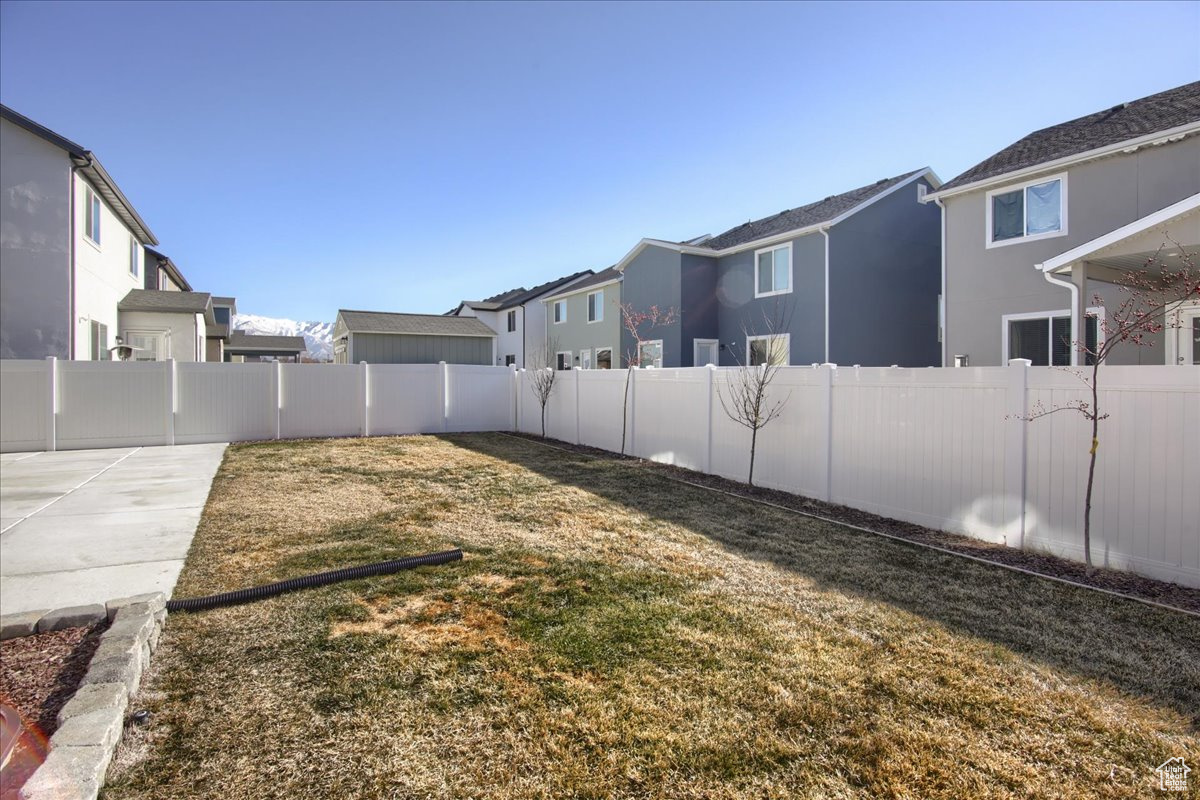 View of yard with a patio