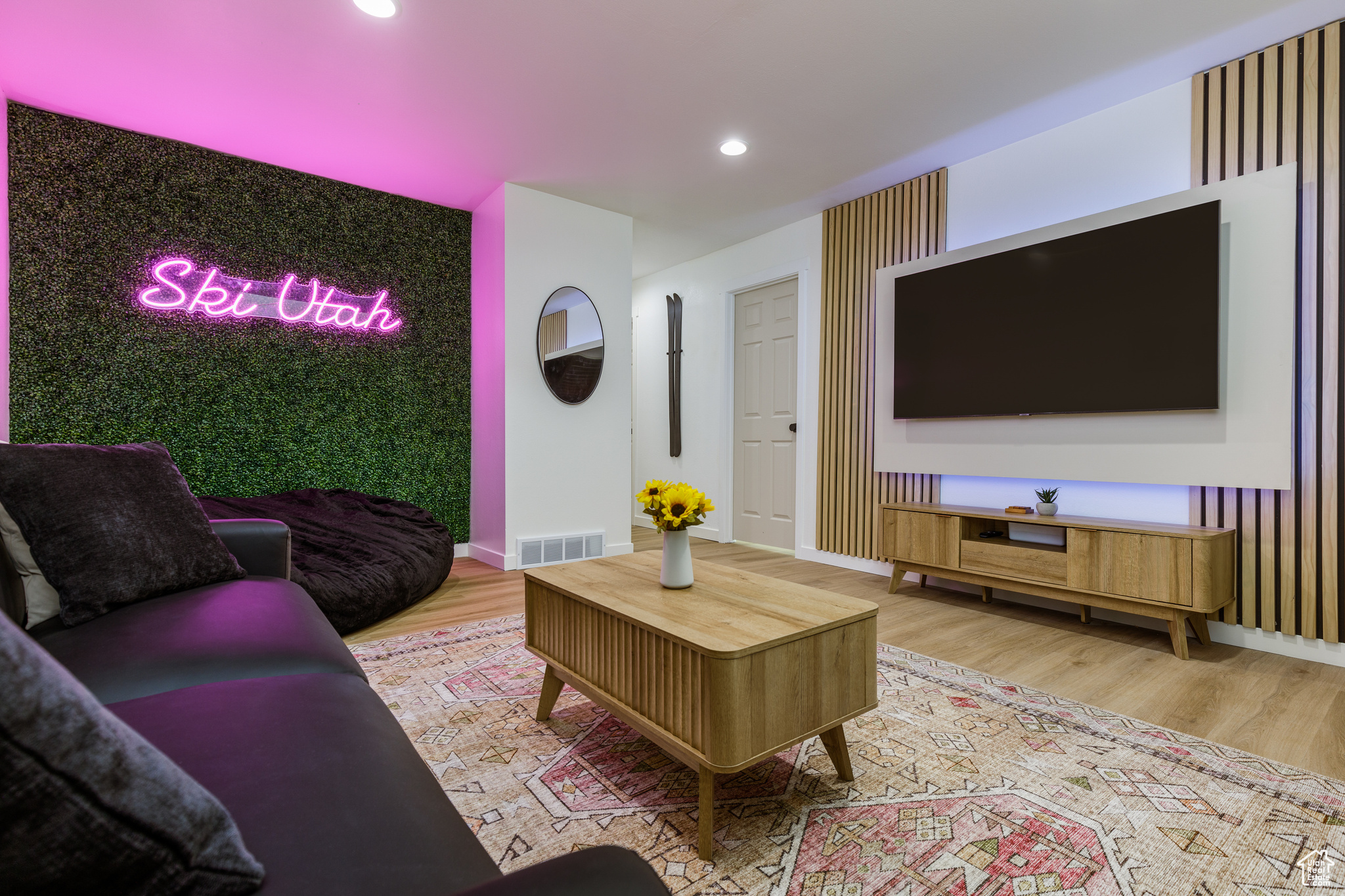 Living room with hardwood / wood-style floors