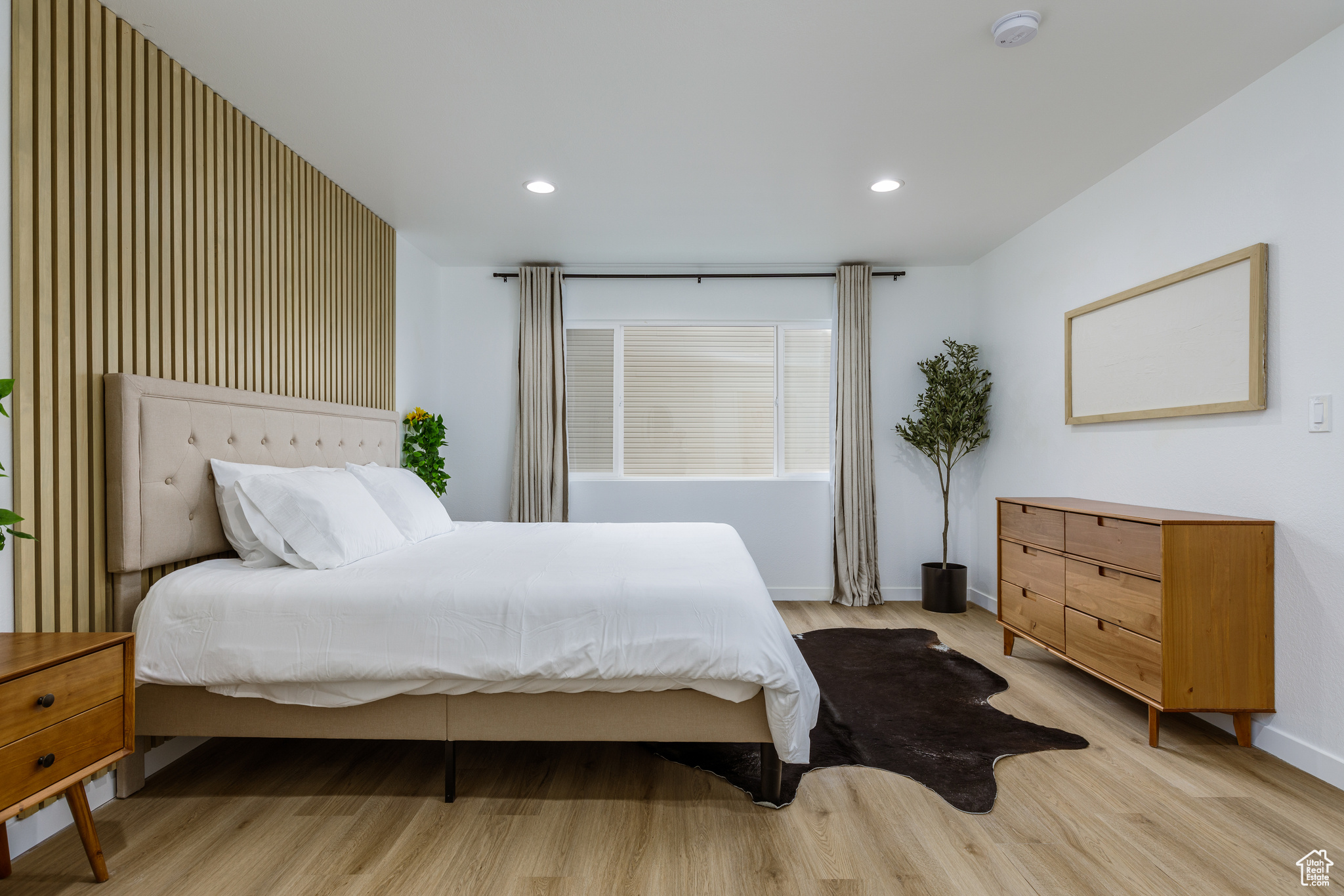 Bedroom featuring light wood-type flooring